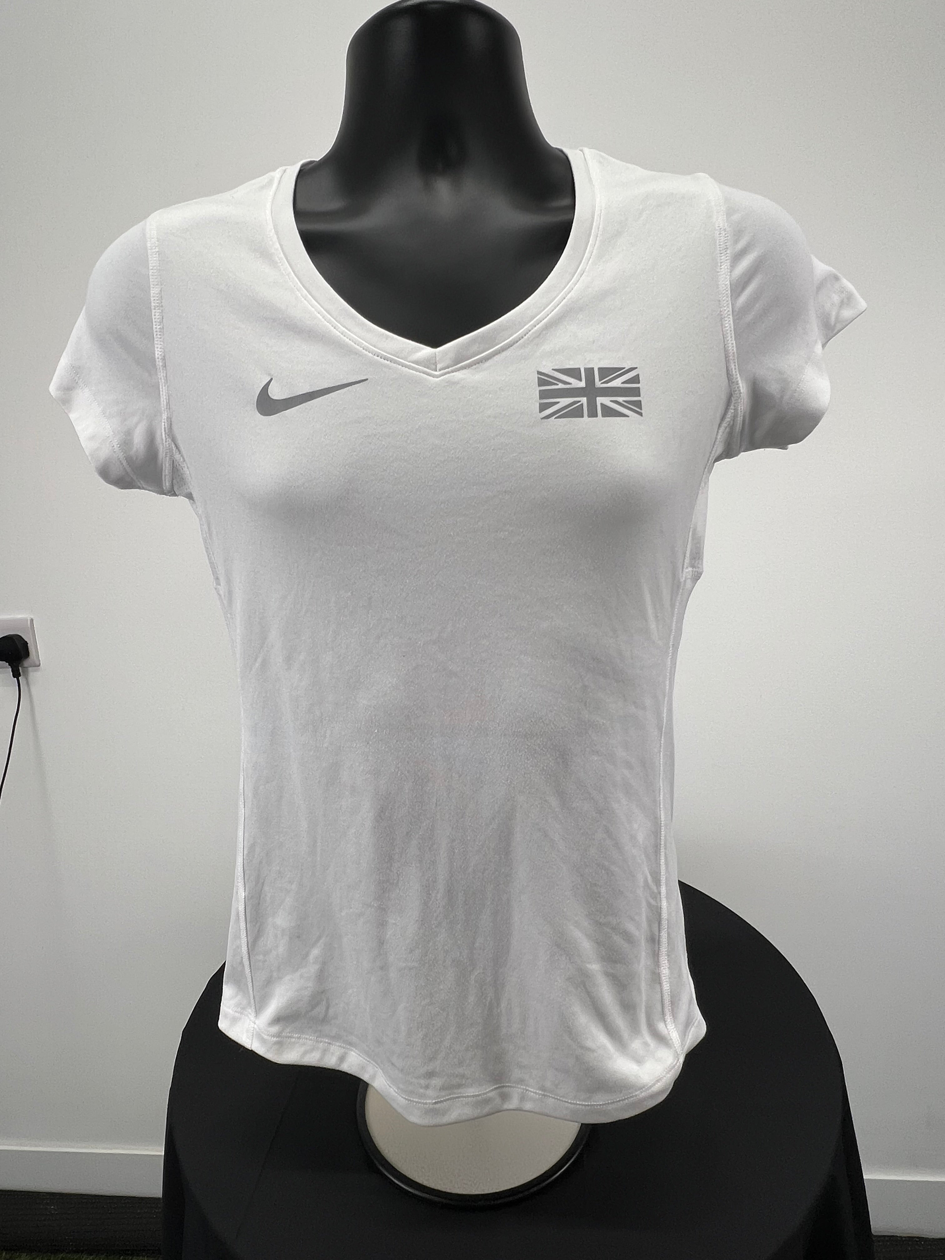 Front view of white women’s Nike Dri-FIT running t-shirt with silver Union Jack and Nike logo on chest