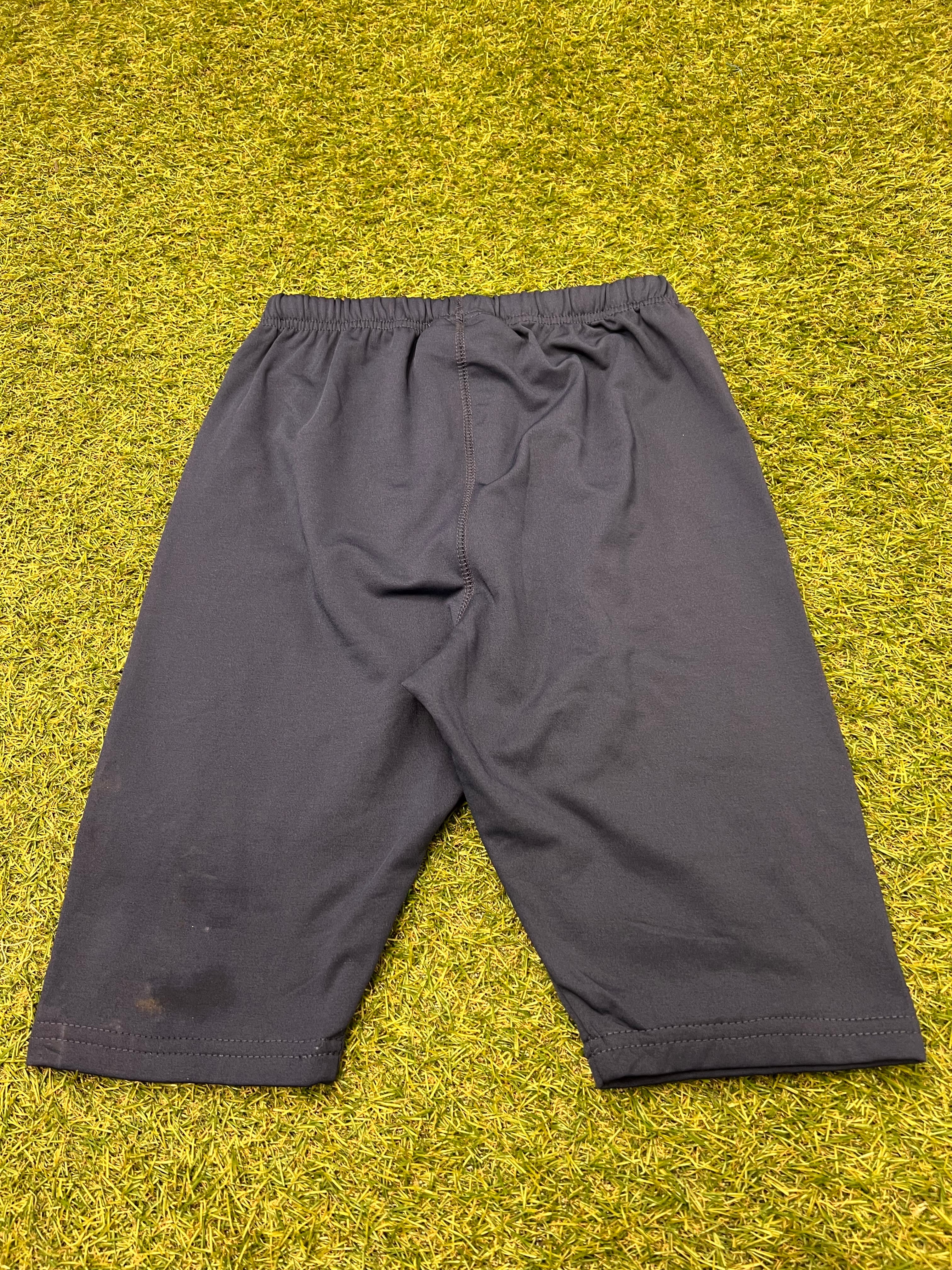 Back view of Kids Kooga Power Rugby Shorts showing elastic waistband and durable fabric