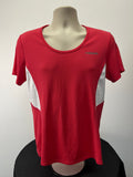 Front view of Head women's red sports t-shirt with white mesh side panels displayed on a mannequin