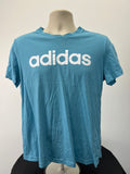 Front view of a turquoise adidas t-shirt with white logo on a mannequin