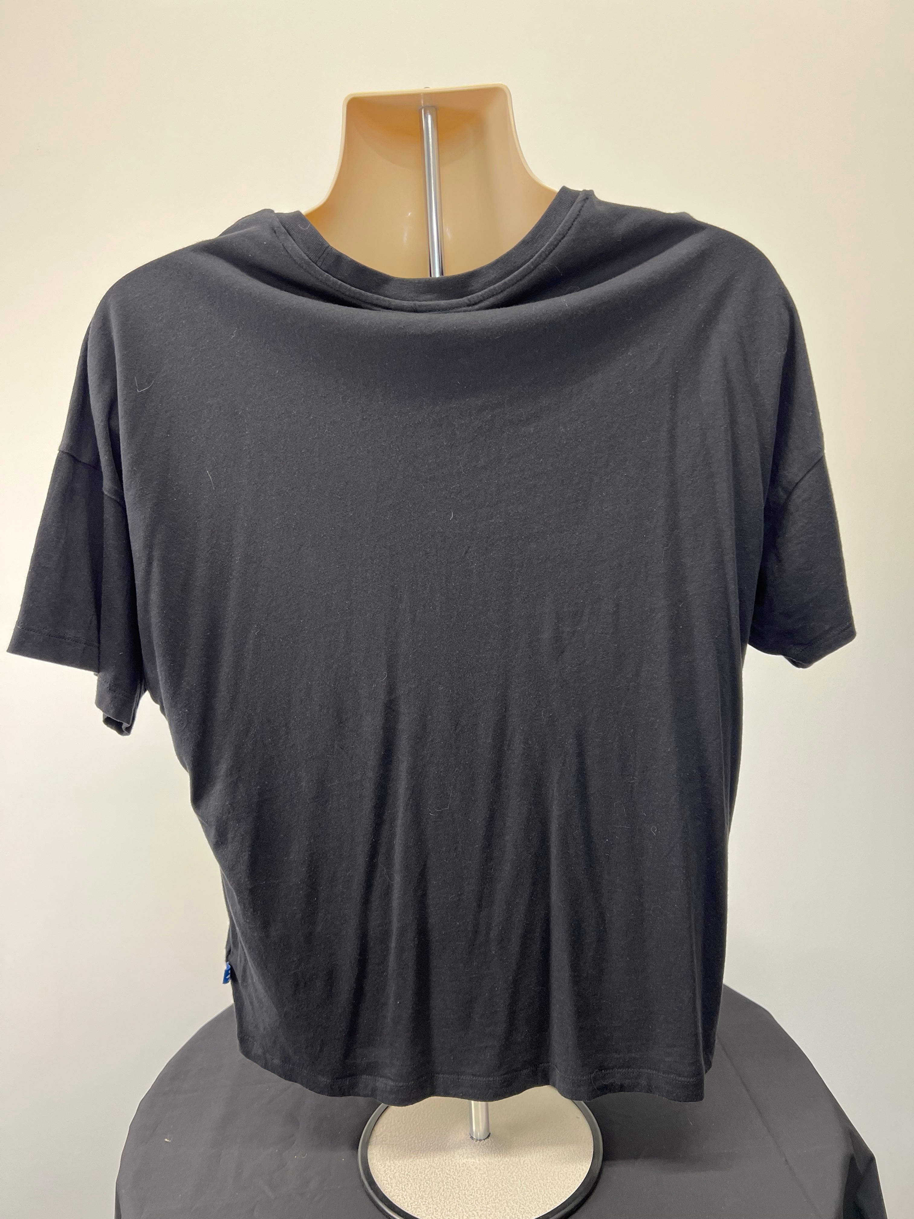 Back view of black Adidas t-shirt showing plain design with short sleeves and crew neckline