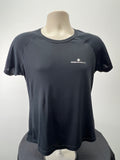 Front view of black Ronhill women's performance t-shirt on mannequin with logo on chest