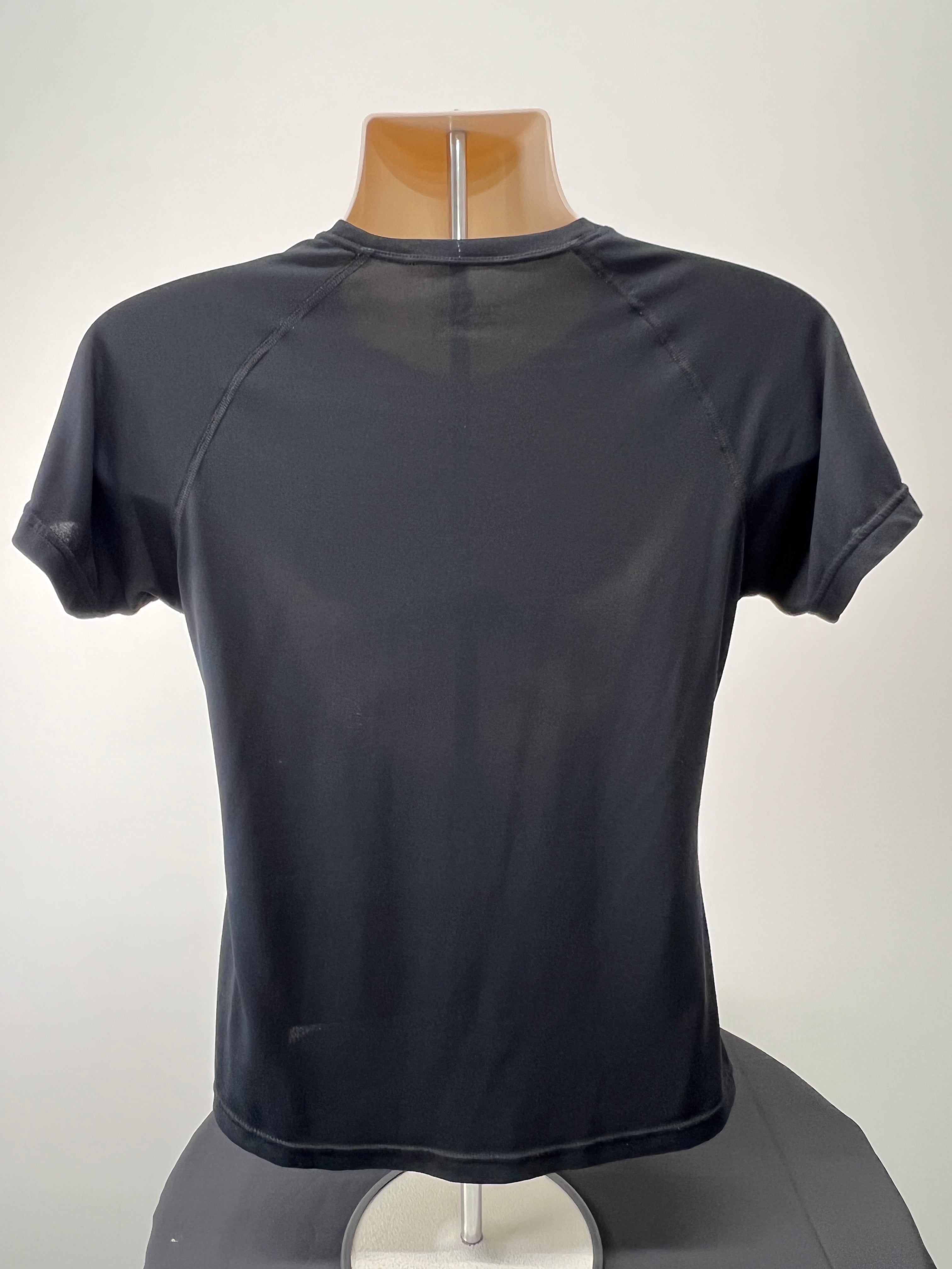 Back view of black Ronhill women's performance t-shirt on mannequin showing smooth fabric and stitching