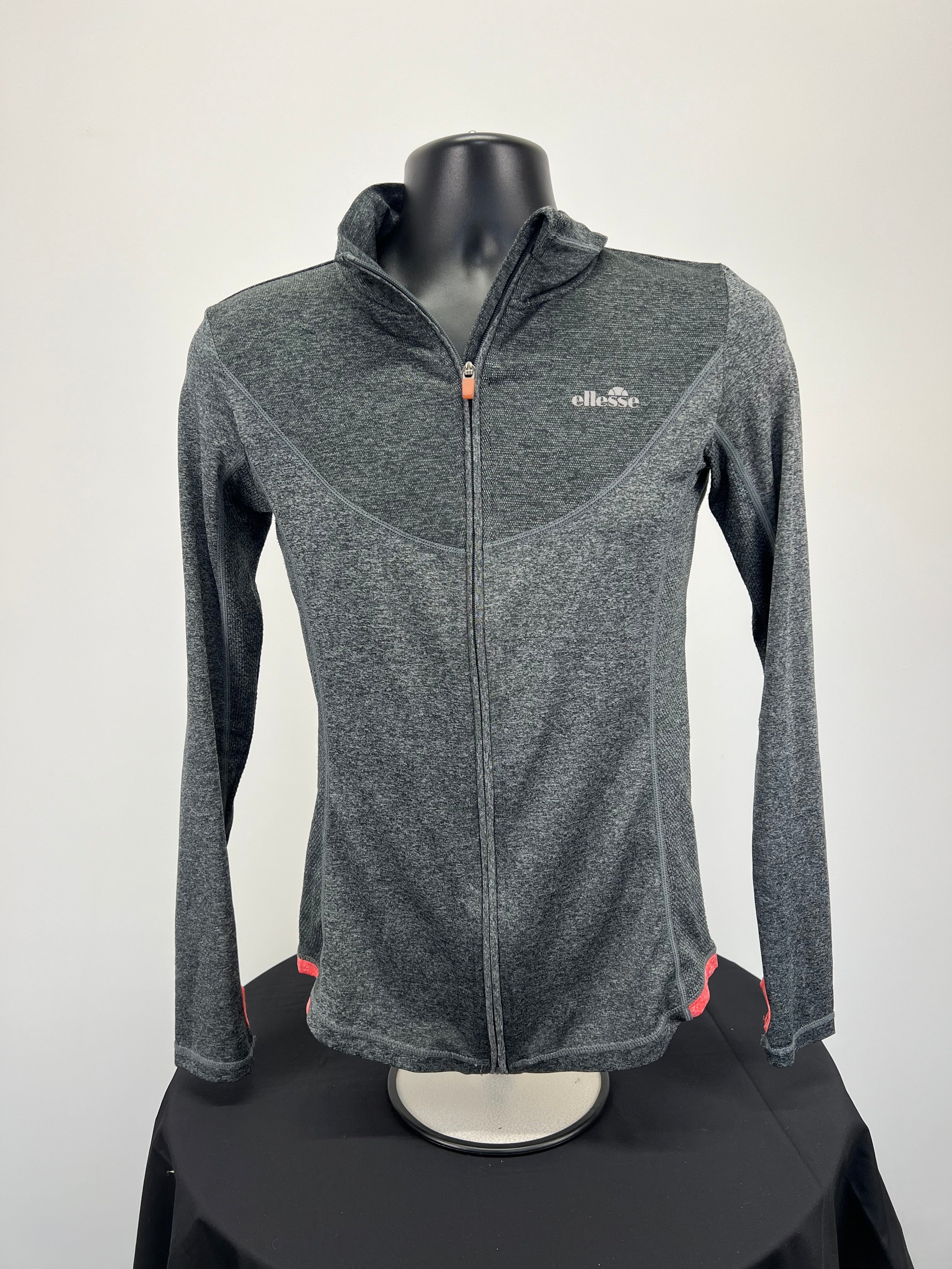 Front view of grey heathered Ellesse women’s full zip jacket with coral accents on mannequin