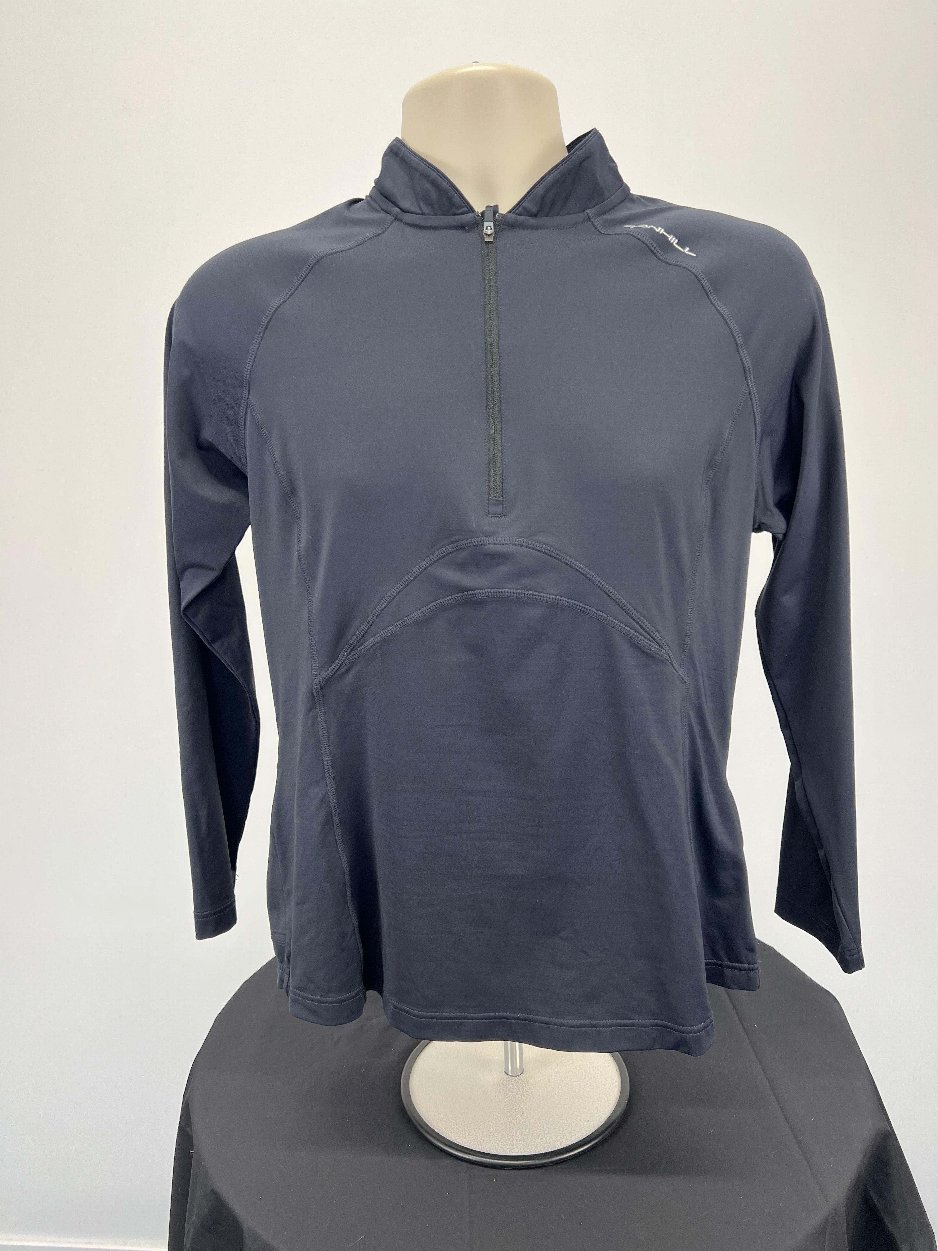 Front view of black Ronhill long sleeve half-zip running top on mannequin