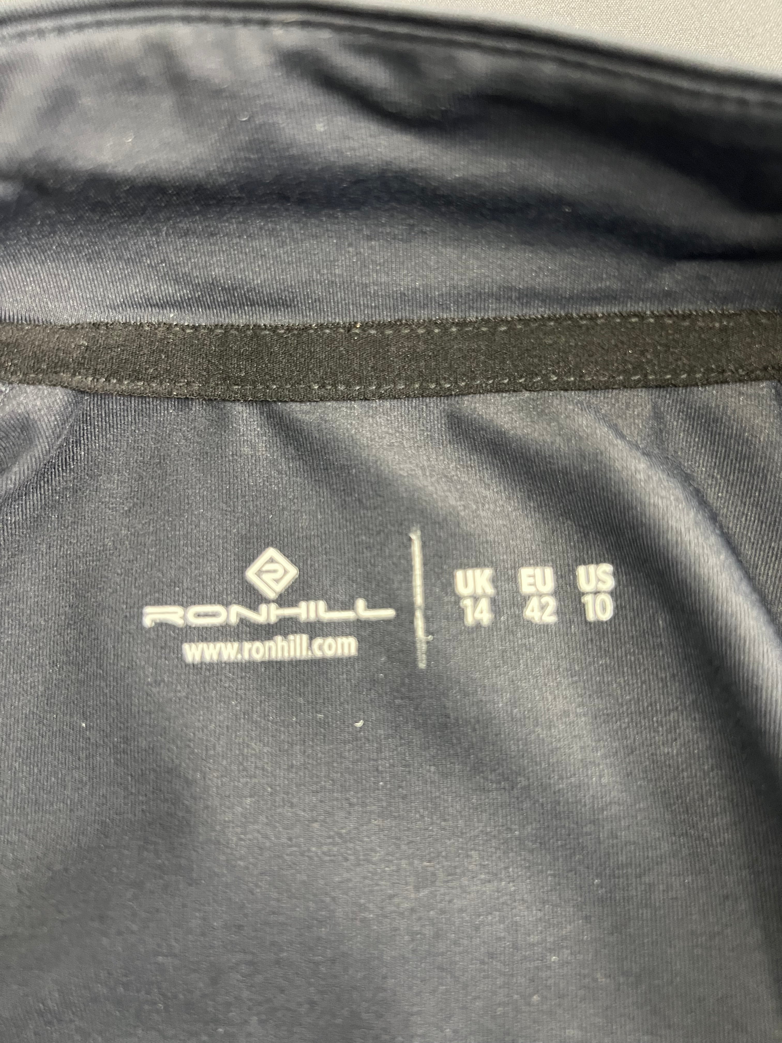 Close-up of Ronhill size label printed inside the running top showing UK 14 EU 42 US 10