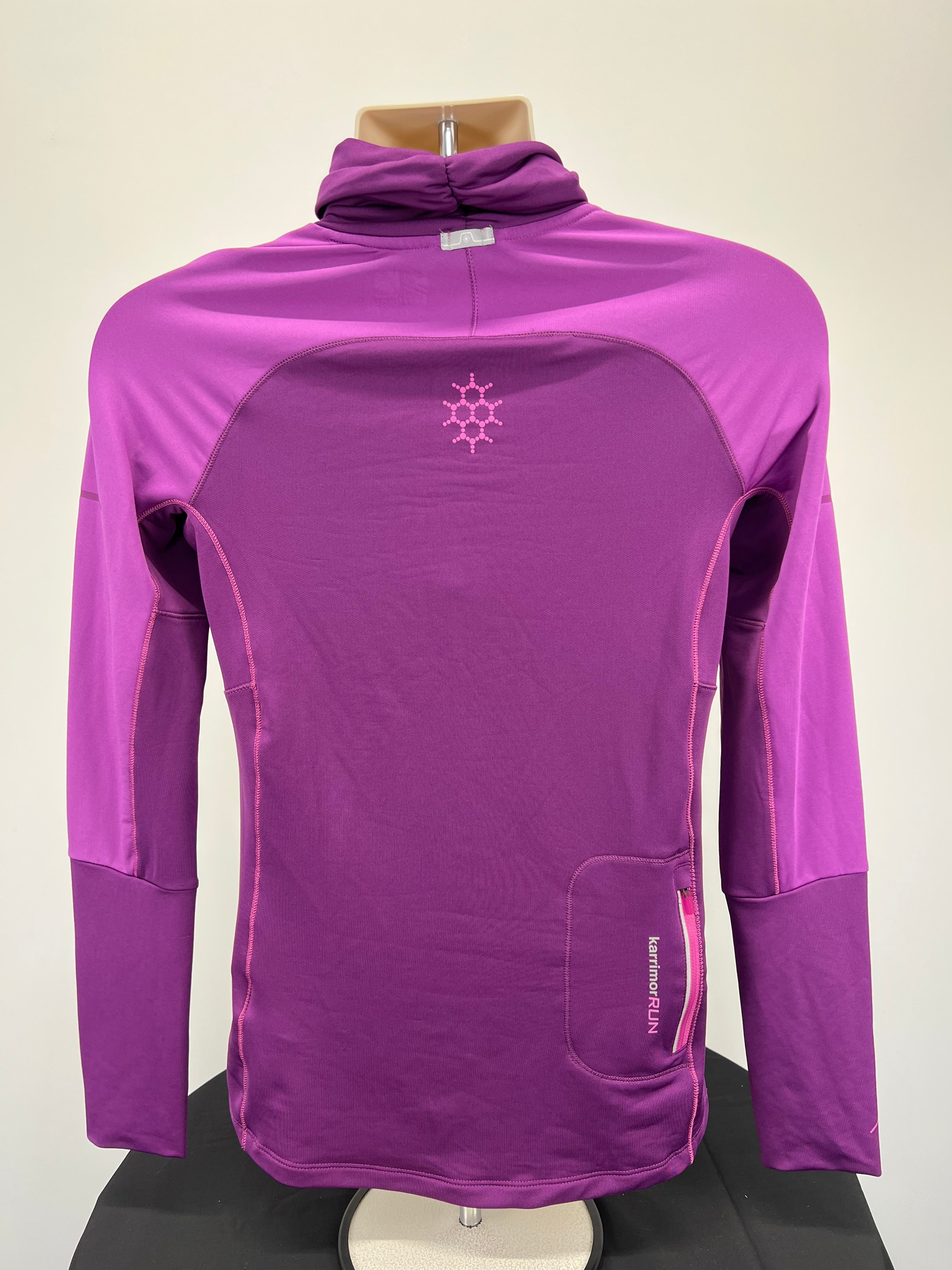 Back view of purple Karrimor Run women's running top showing zipped pocket and reflective detailing