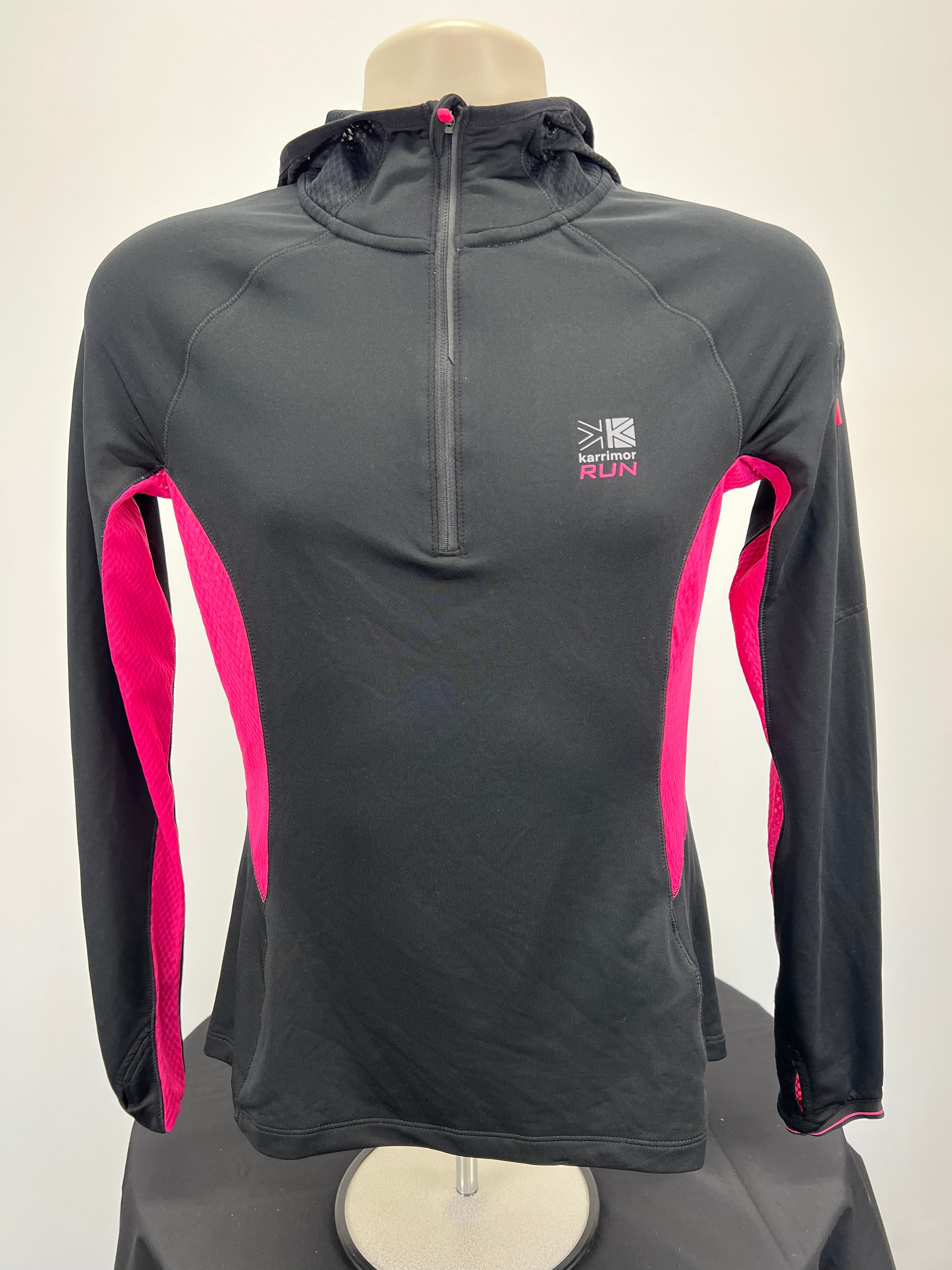 Front view of Karrimor women's black and pink hooded running top with half-zip