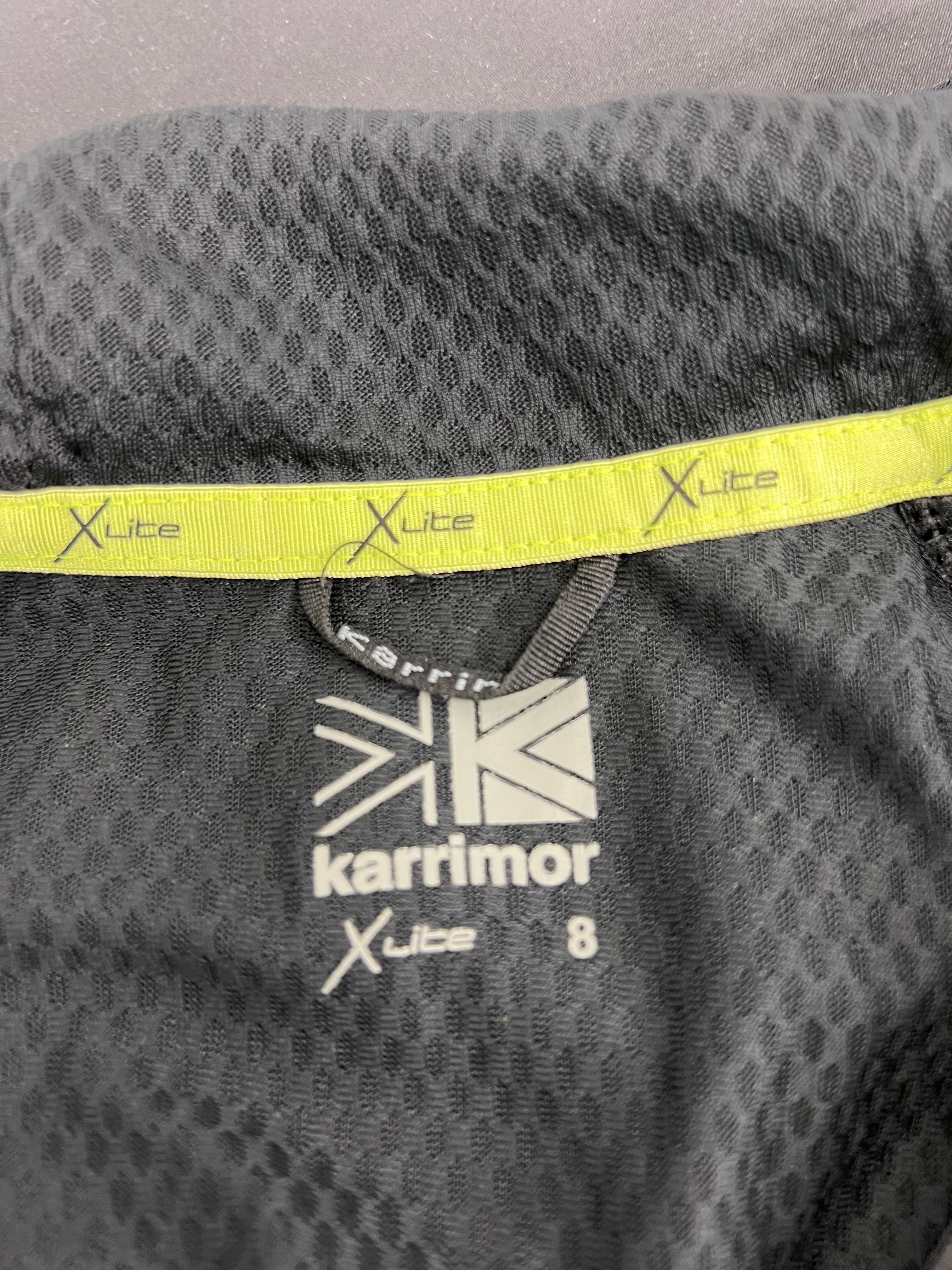 Close-up image of Karrimor X-Lite label inside the collar of the women's running top