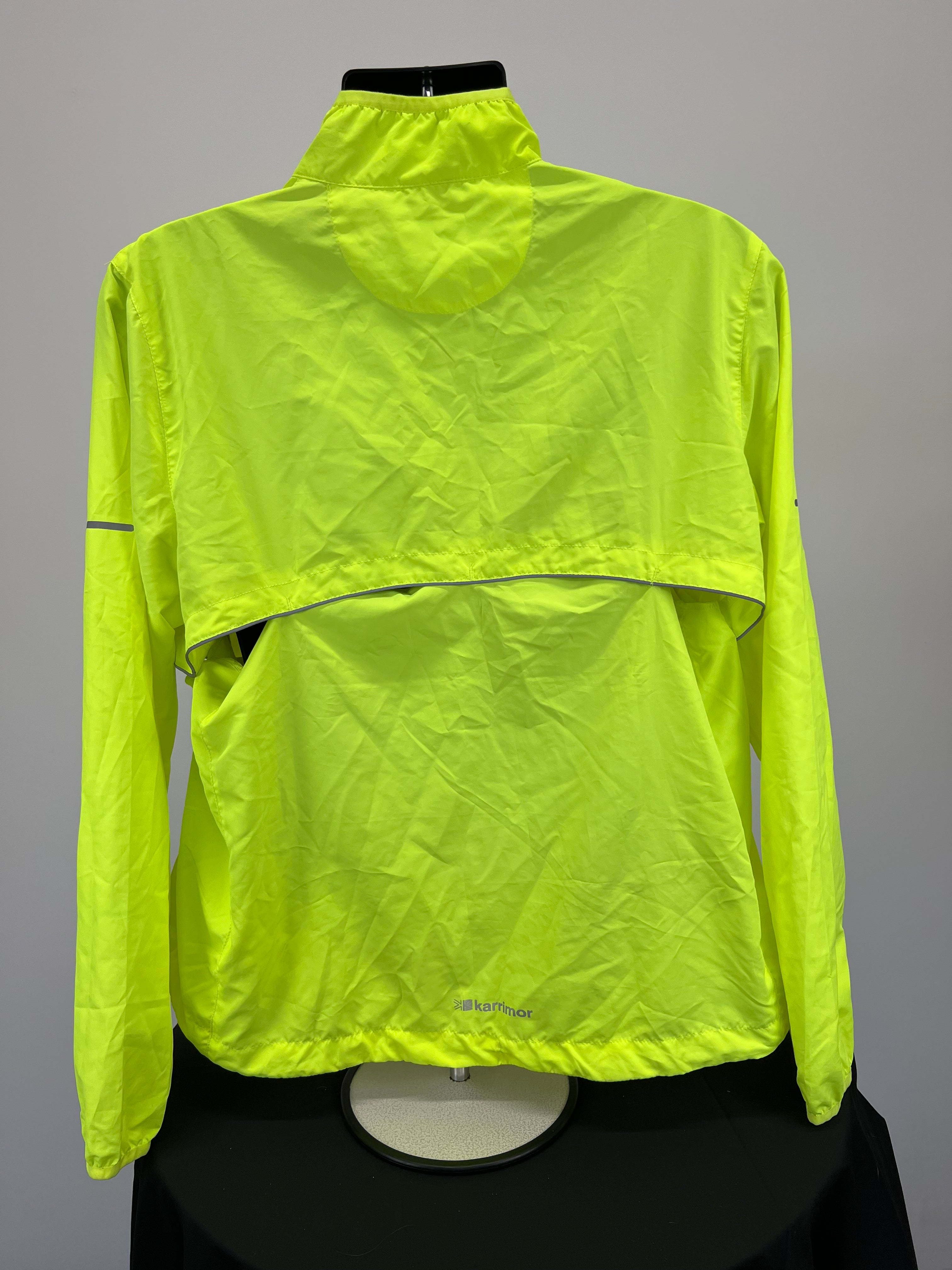 Back view of neon yellow running jacket showing rear ventilation flap and reflective strip
