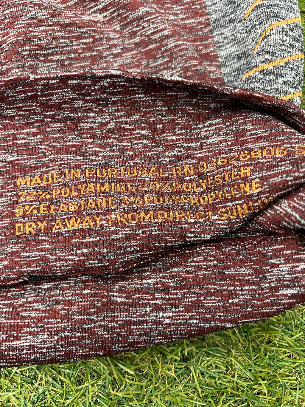 Close-up of material composition printed inside seamless Sweaty Betty leggings showing polyamide, polyester, elastane blend