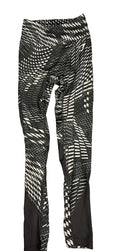 Front view of Gymshark black and white geometric print performance leggings laid flat on grass