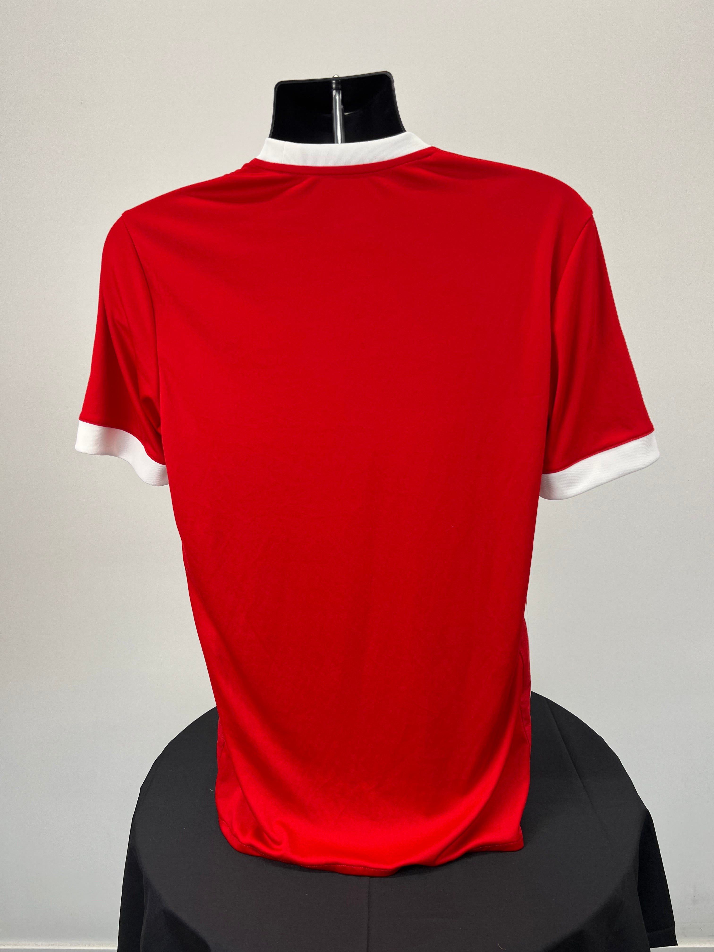 Back view of red Middlesbrough FC football shirt showing plain red design with white sleeve cuffs