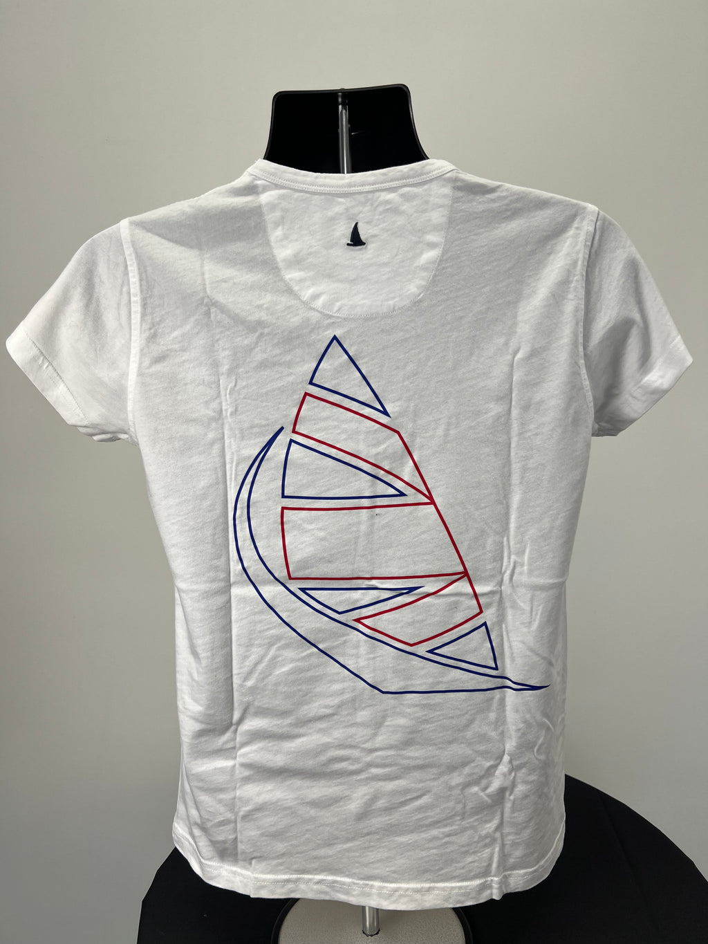 Back view of Musto white T-shirt displaying abstract red and blue sailboat design