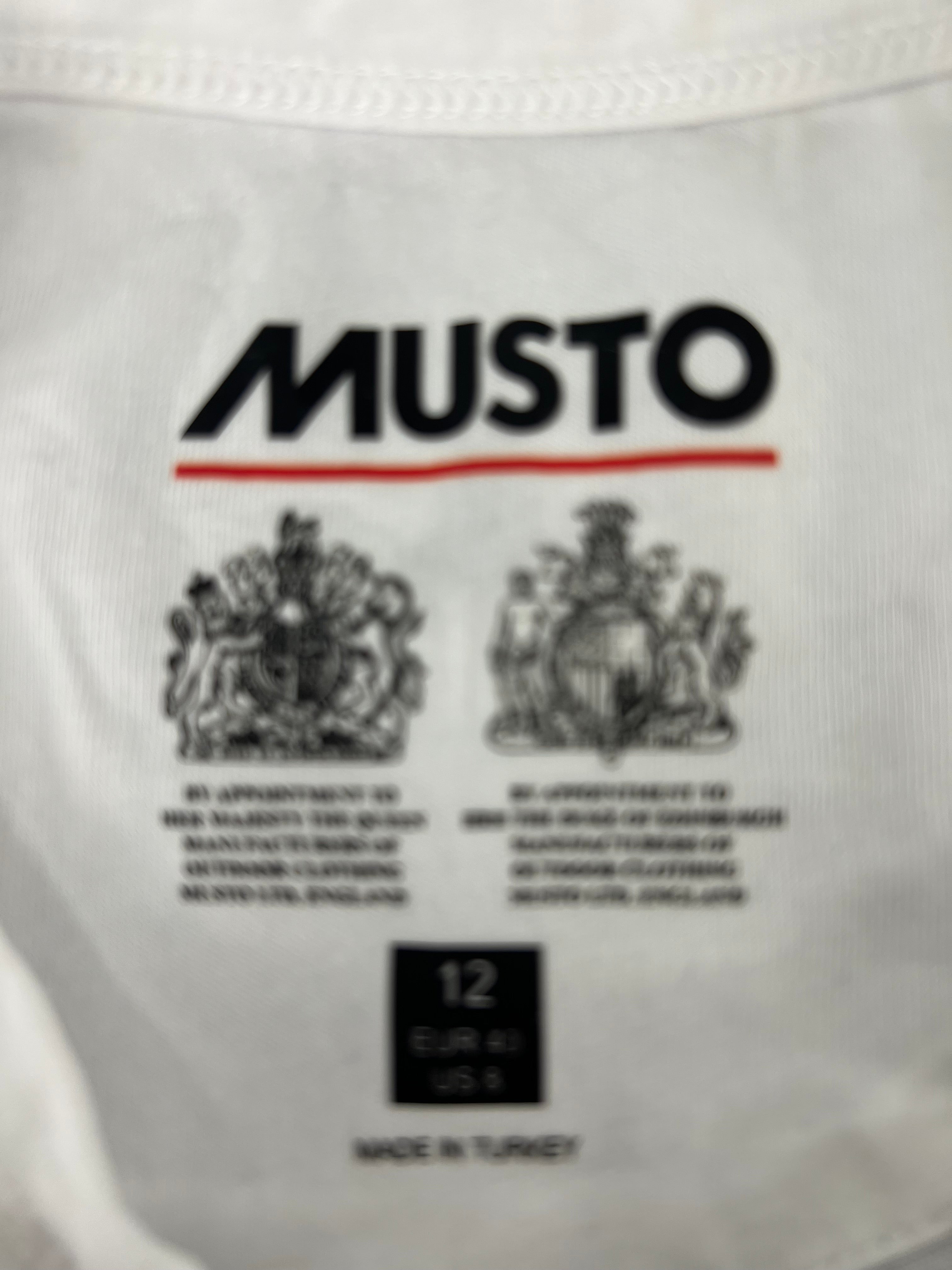 Close-up of Musto label inside T-shirt showing size 12 and origin made in Turkey