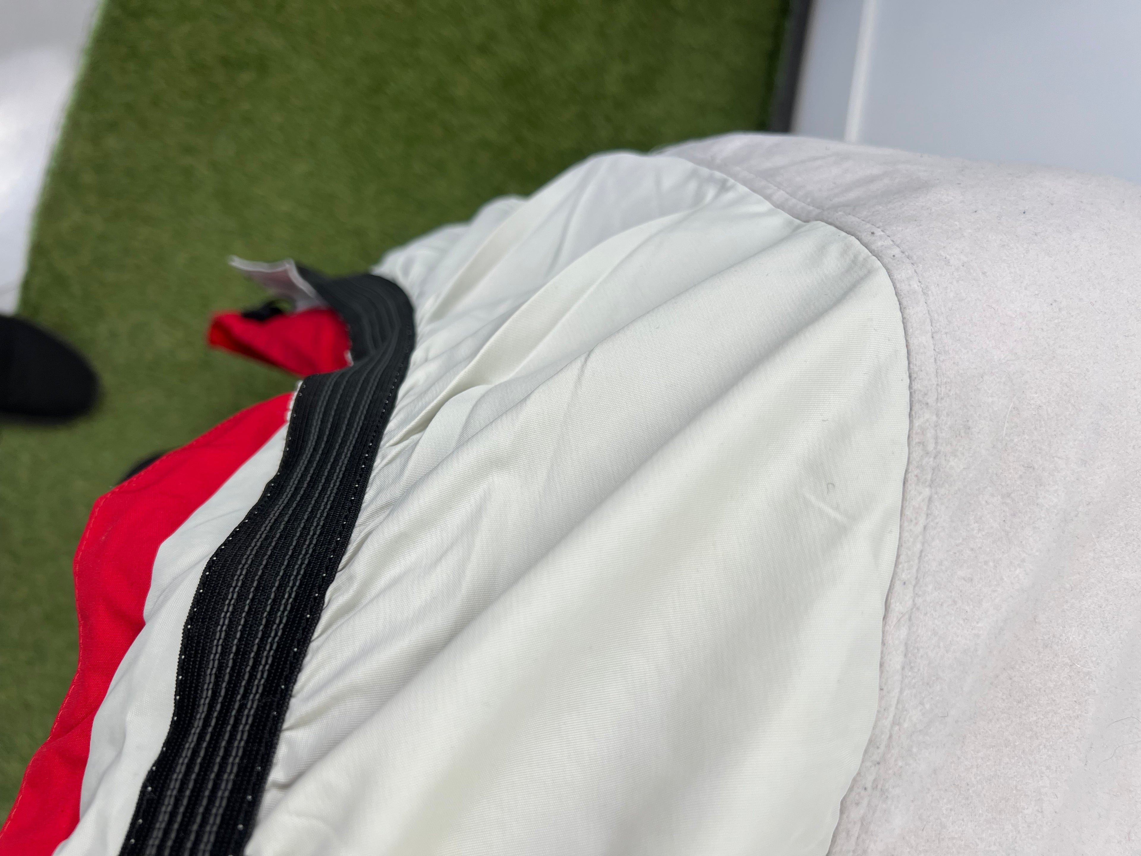 Close-up of size label inside jacket reading 'Eider Mega 58 Goretex Exterieur'