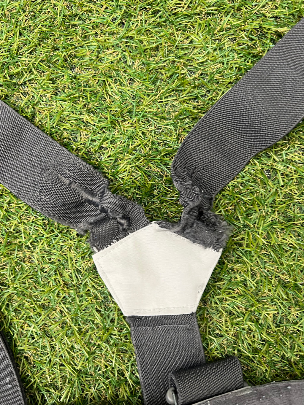 Close-up of elasticated inner cuffs with black fabric on the bottom of the ski trousers