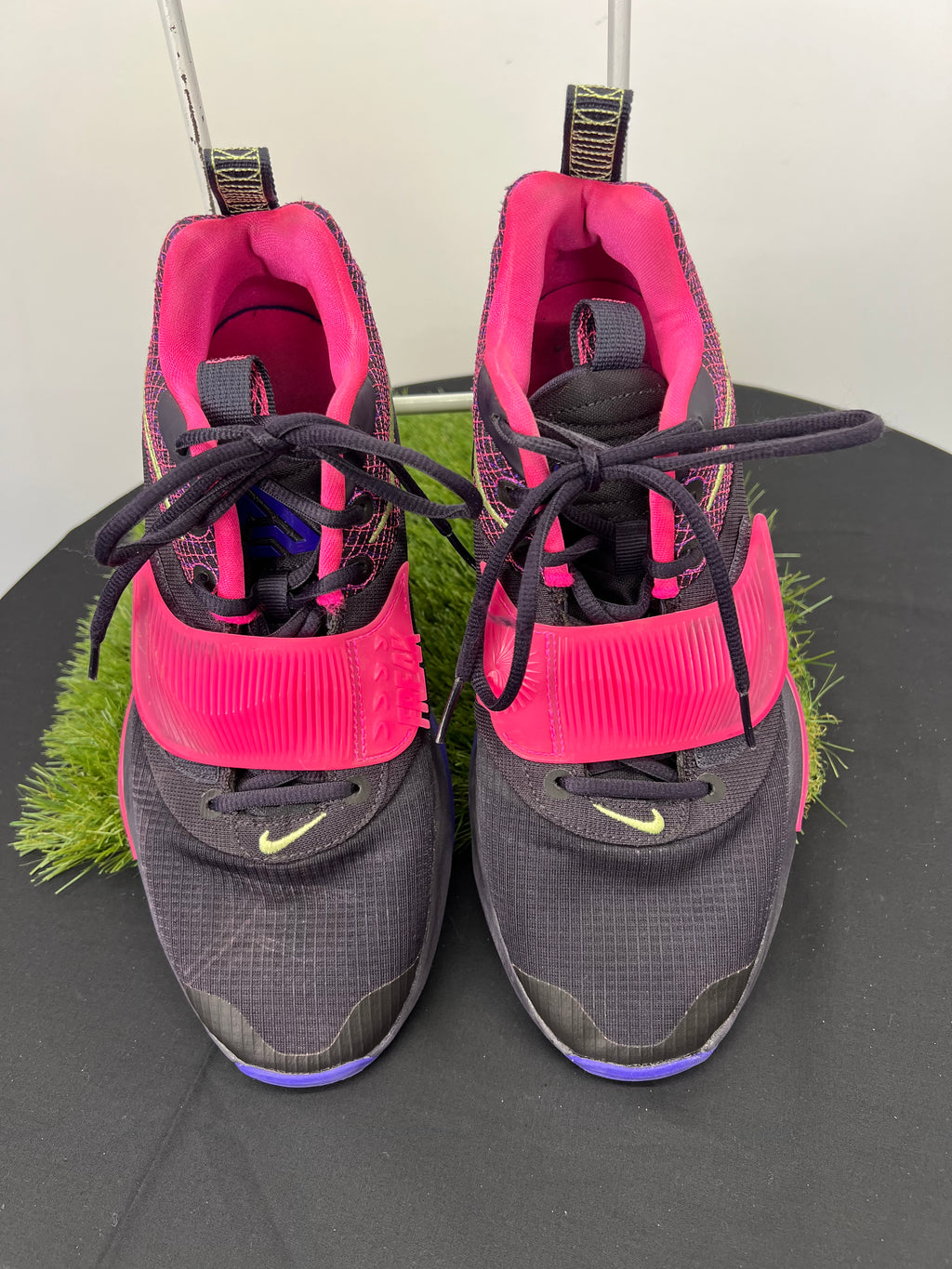 Front view of Nike Zoom Freak 3 basketball trainers in black with bright pink strap and neon yellow details