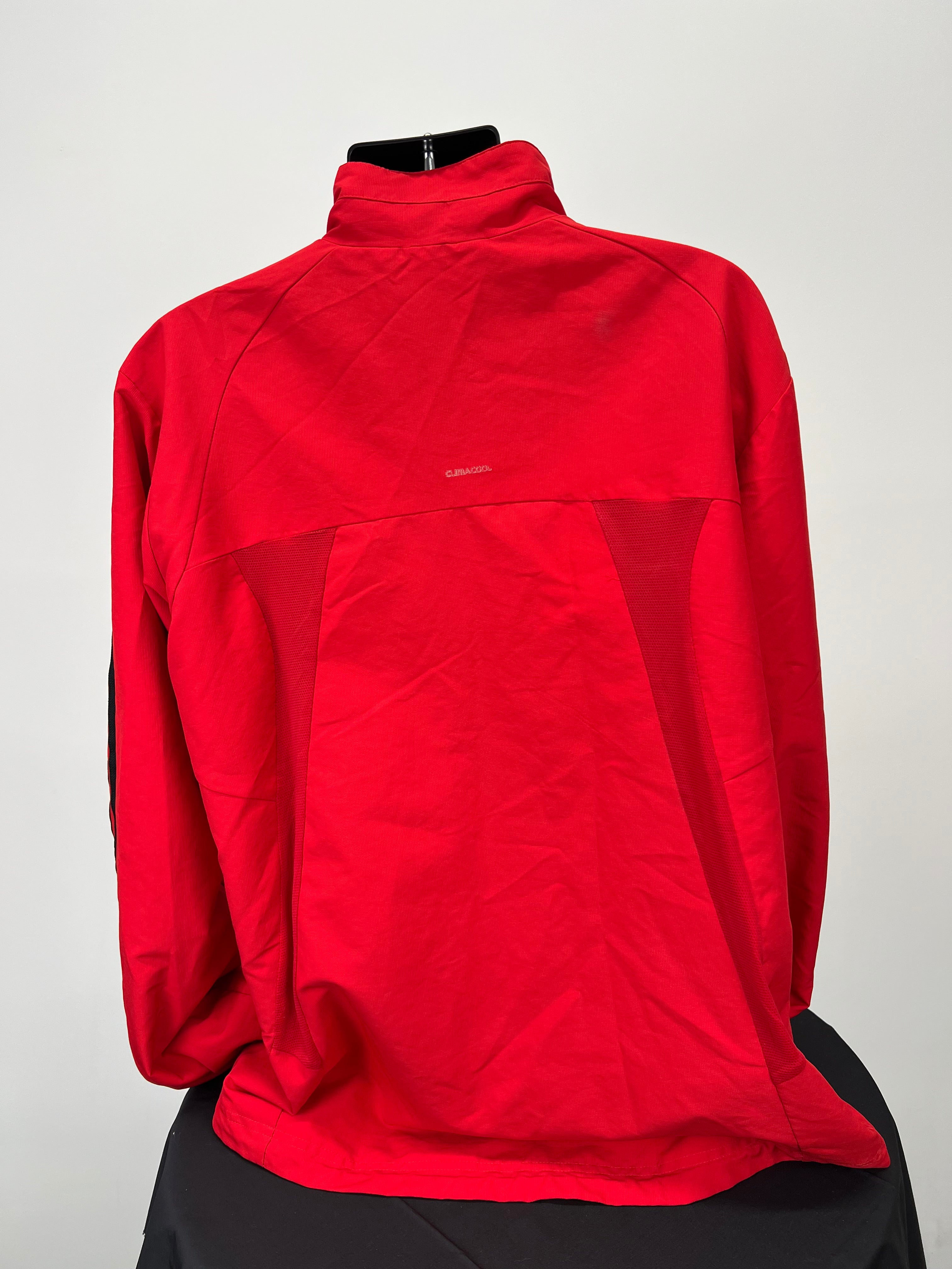 Back view of Adidas men's lightweight red jacket showing breathable mesh detailing and Climacool branding
