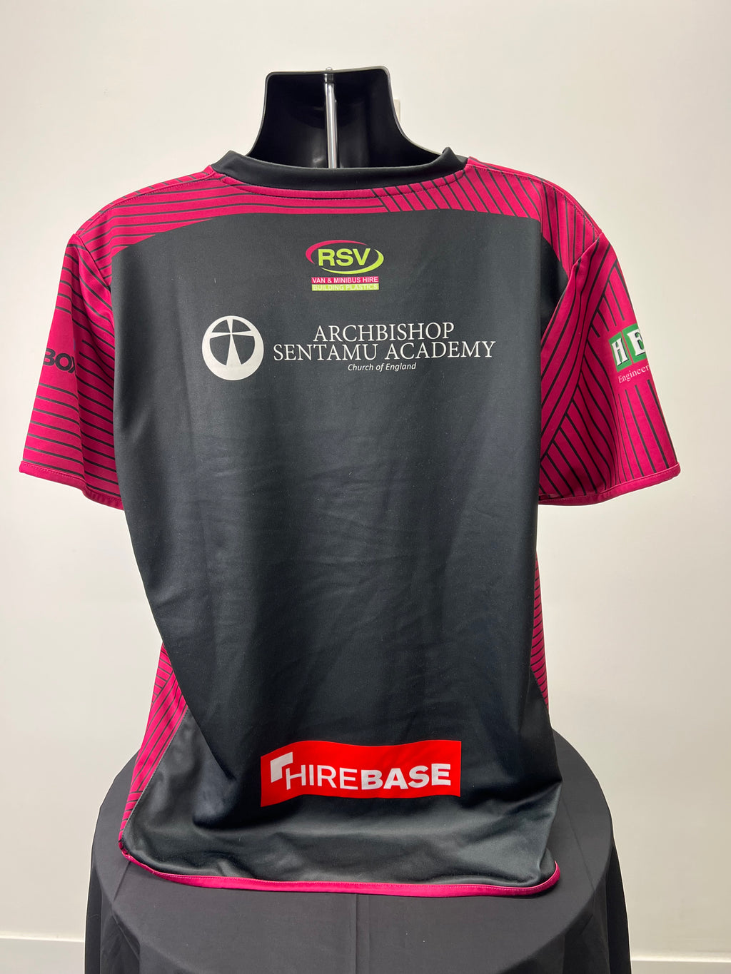 Back view of Hull Kingston Rovers men's rugby jersey showing additional sponsor logos on black and magenta fabric