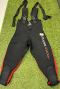Front view of black and red Rooster sailing neoprene bib trousers laid flat showing adjustable shoulder straps