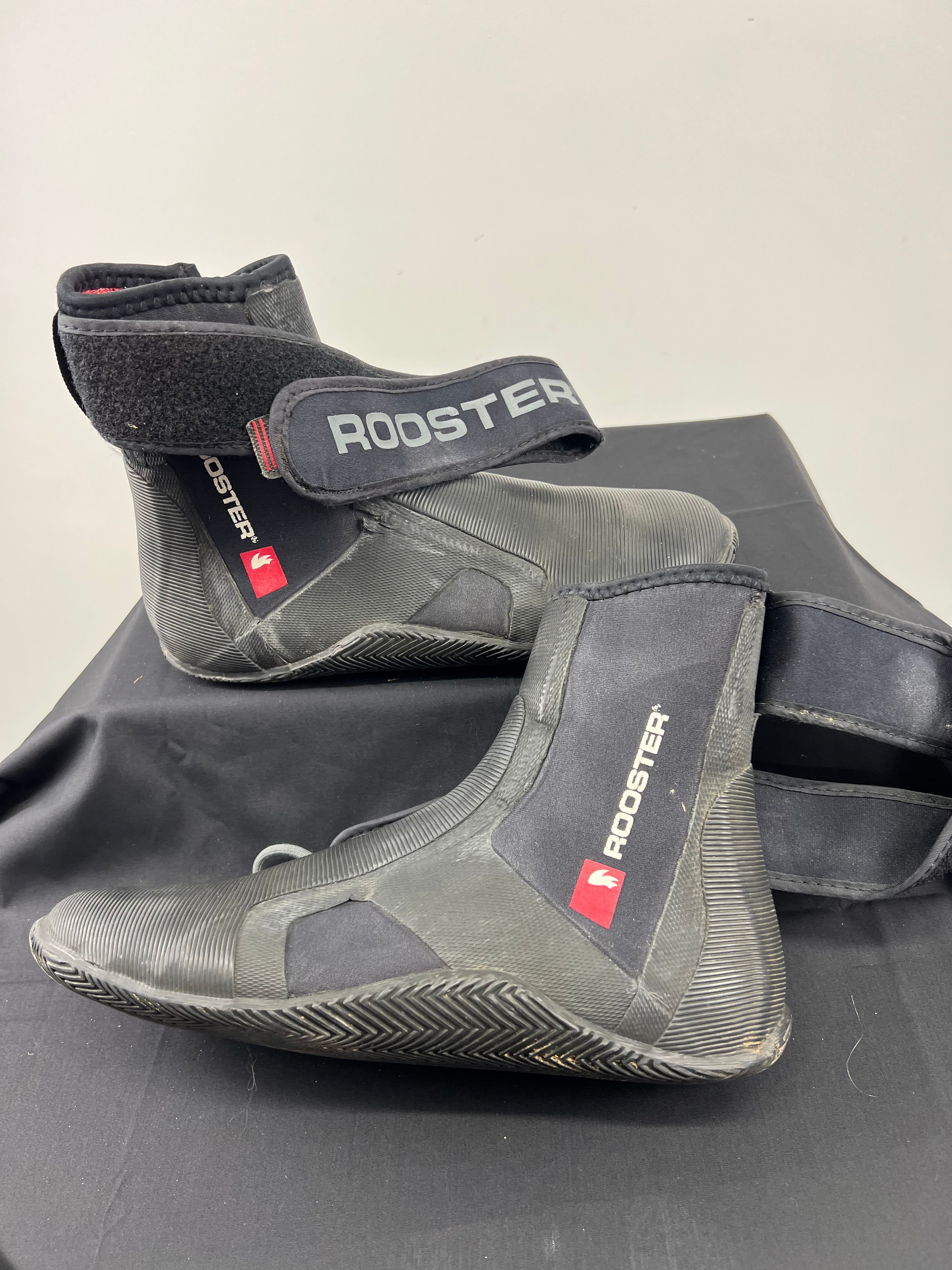 Rooster Pro boots displayed side by side highlighting ankle strap closure and neoprene material