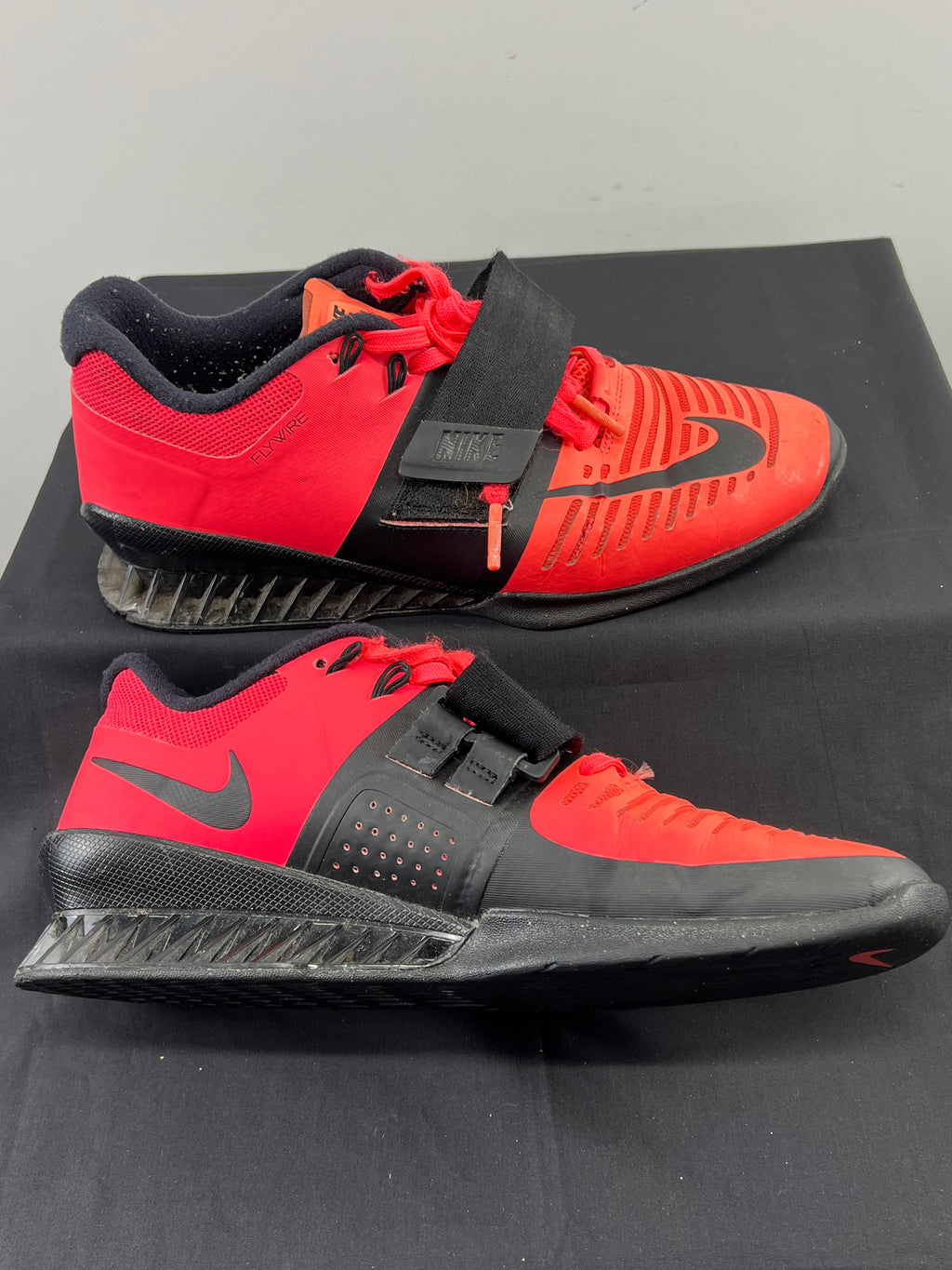 Left side view of Nike Romaleos 3 showing the mesh and synthetic upper, Flywire branding, and strong black midfoot strap