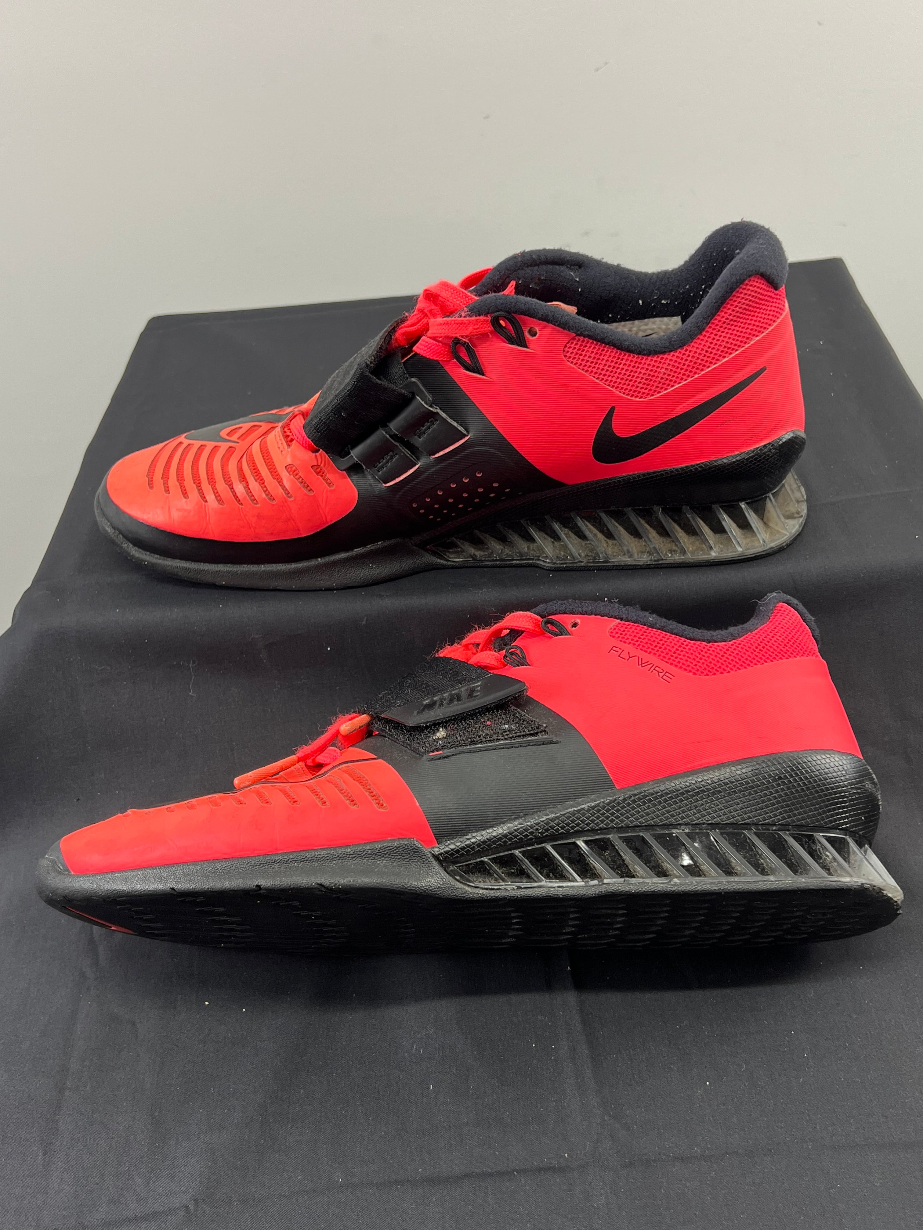 Right side profile of Nike Romaleos 3 weightlifting shoes highlighting the raised heel plate and robust sole construction