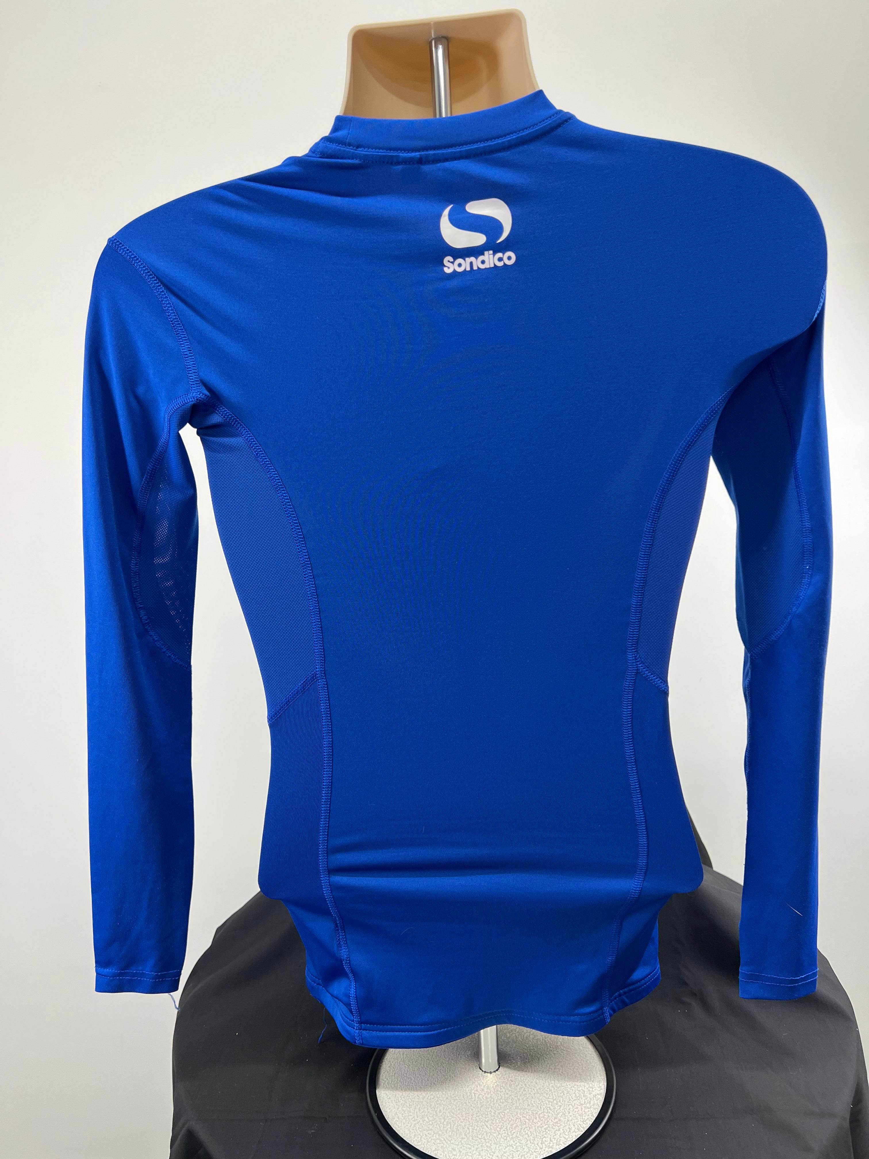Back view of Sondico men's long sleeve base layer showing logo on upper back in vivid blue
