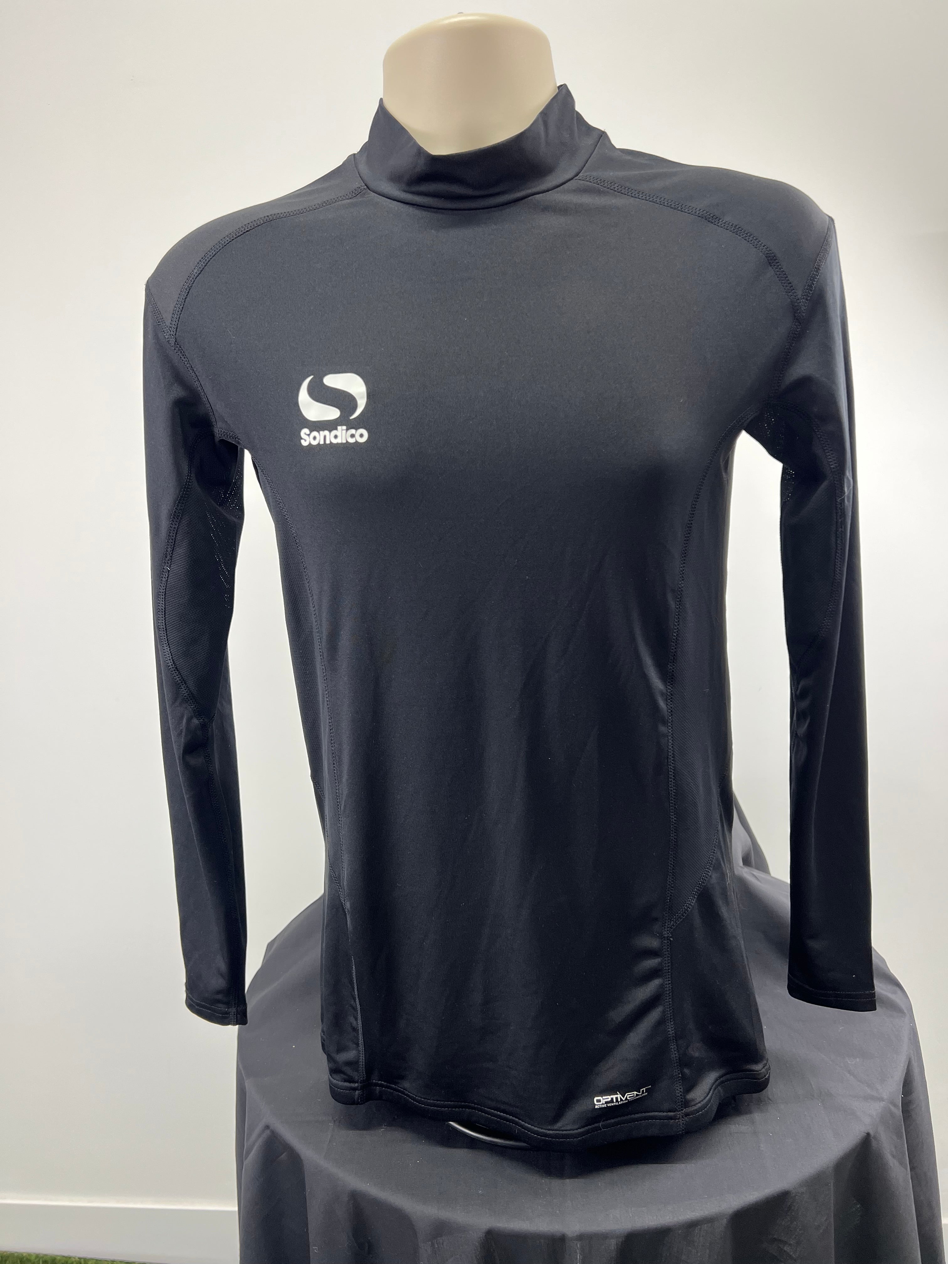 Front view of black Sondico long sleeve base layer with mock neck on mannequin