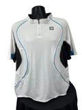 Front view of Wilson white sports top with black and blue details and 1/4 zip on black mannequin