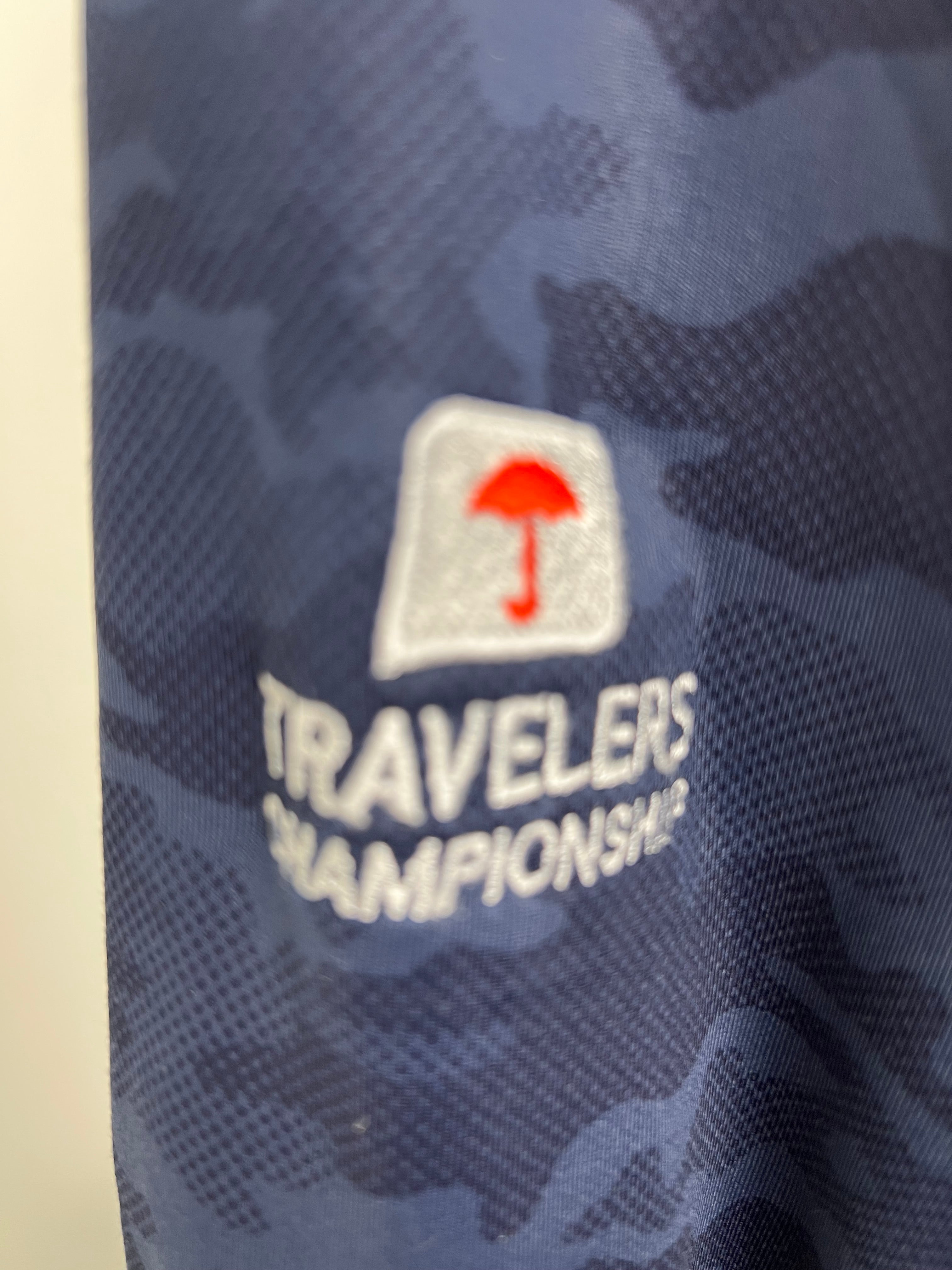 Close-up of embroidered Travelers Championship logo on hoodie sleeve