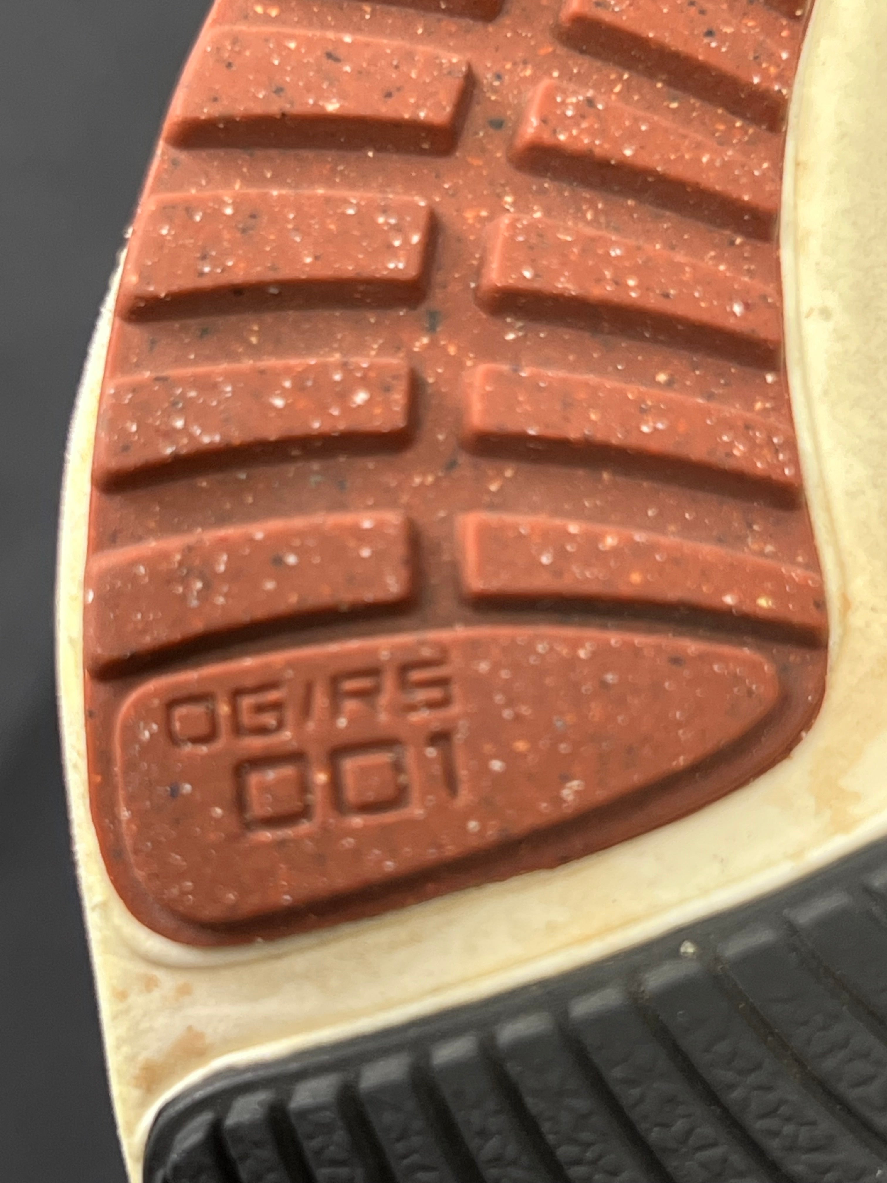 Nike Air Zoom Pegasus 38 label inside the shoe on red fabric strip