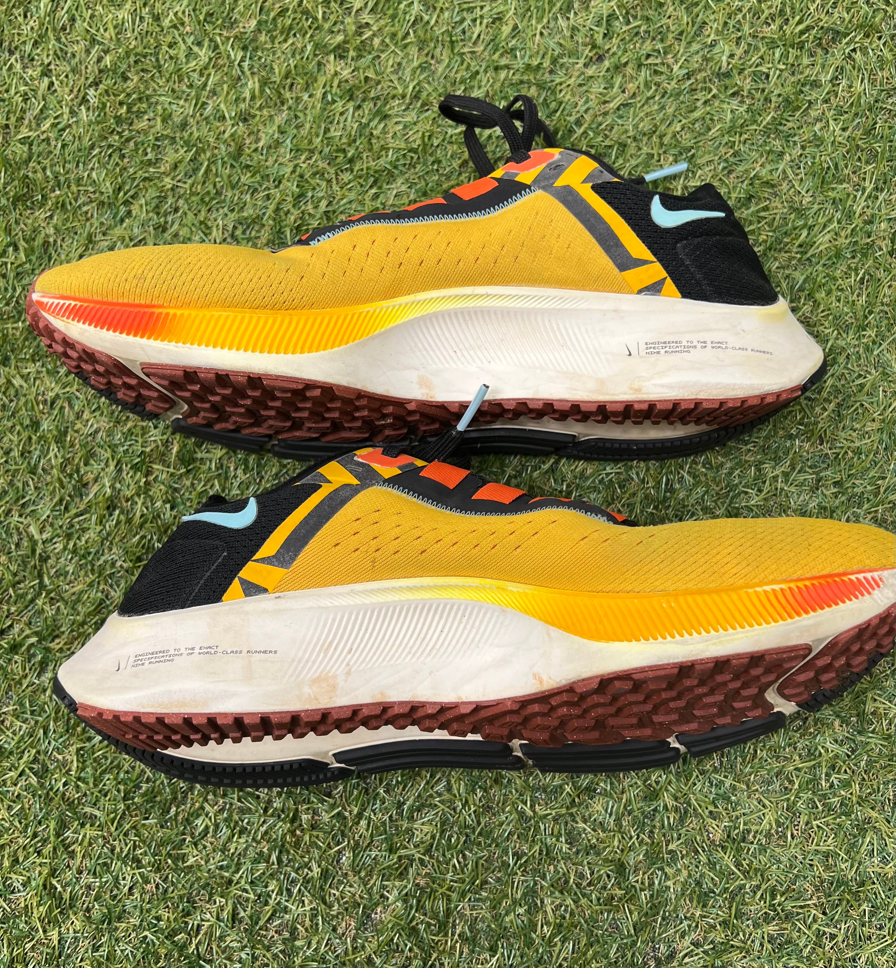 Close-up of rubber sole showing textured tread and inscription 'OG/RS 001'