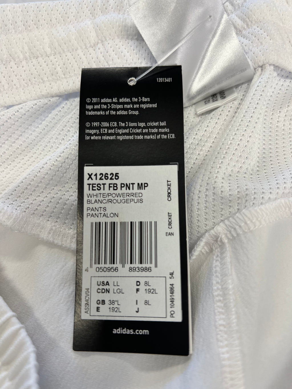 Close-up of product information tag detailing size and official licensing from ECB