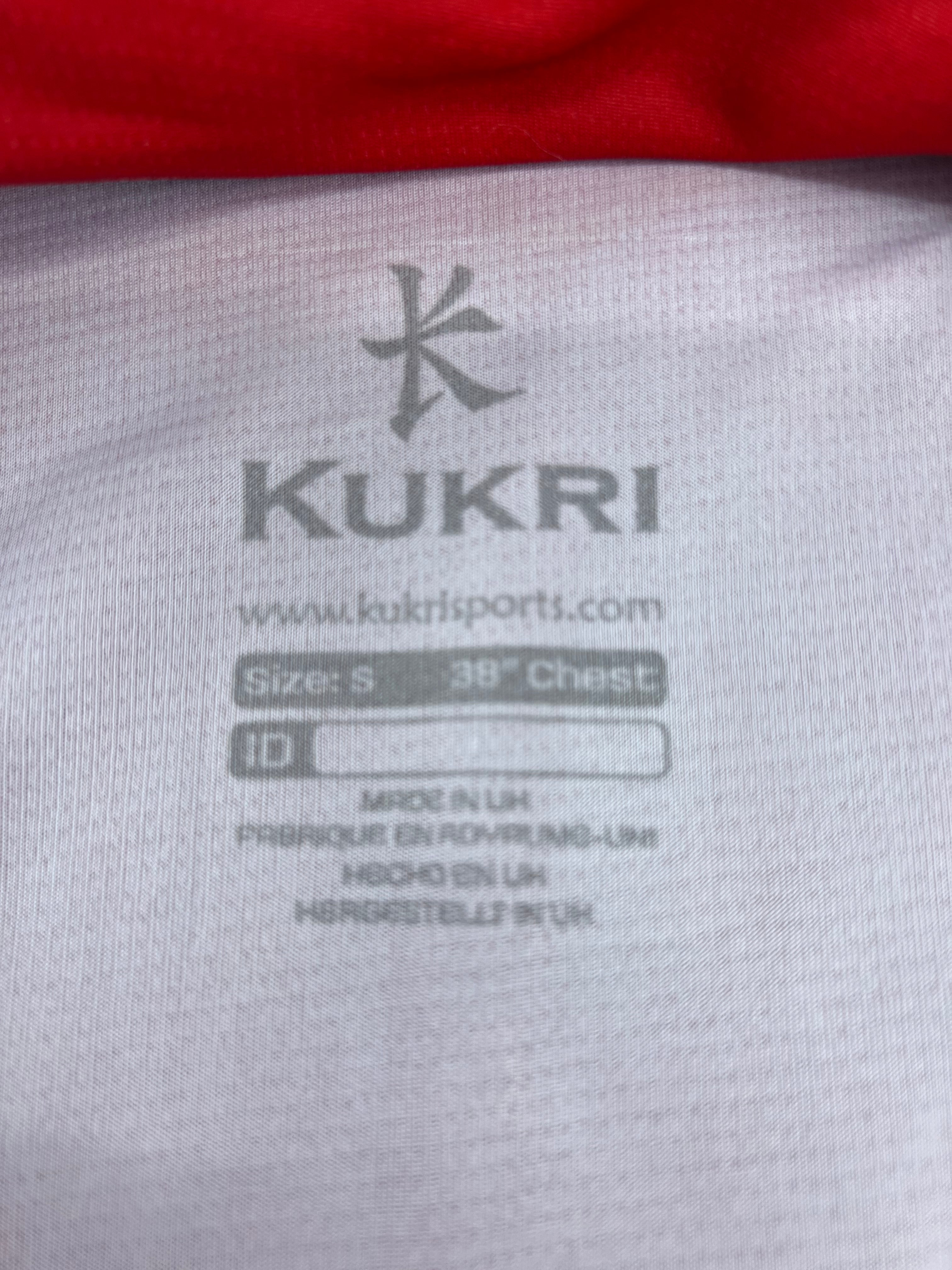 Close-up of inside label showing Kukri branding, size S 38 inch chest, and made in UK