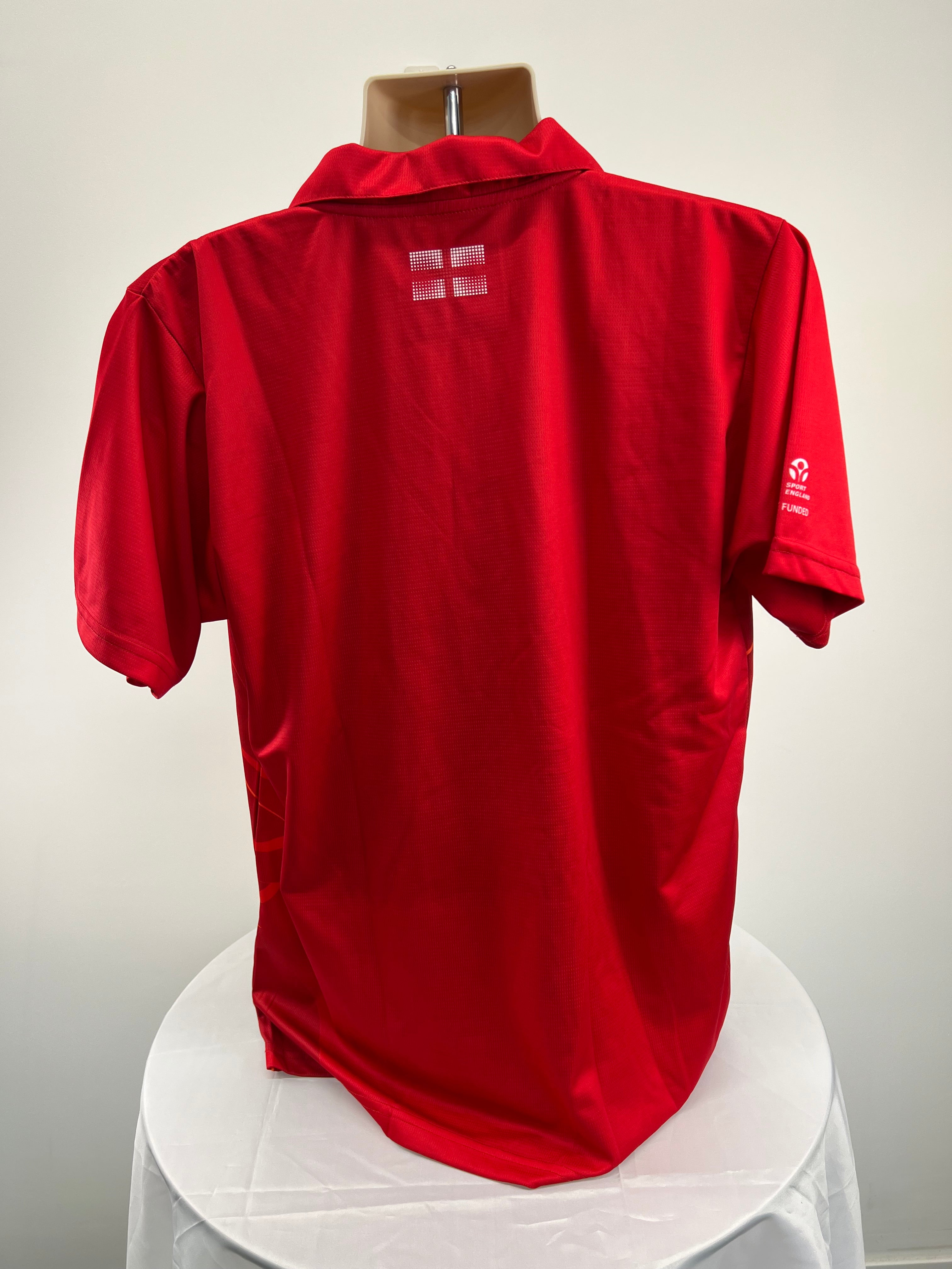 Back view of men's red Team England Commonwealth Games polo shirt showing England flag detail