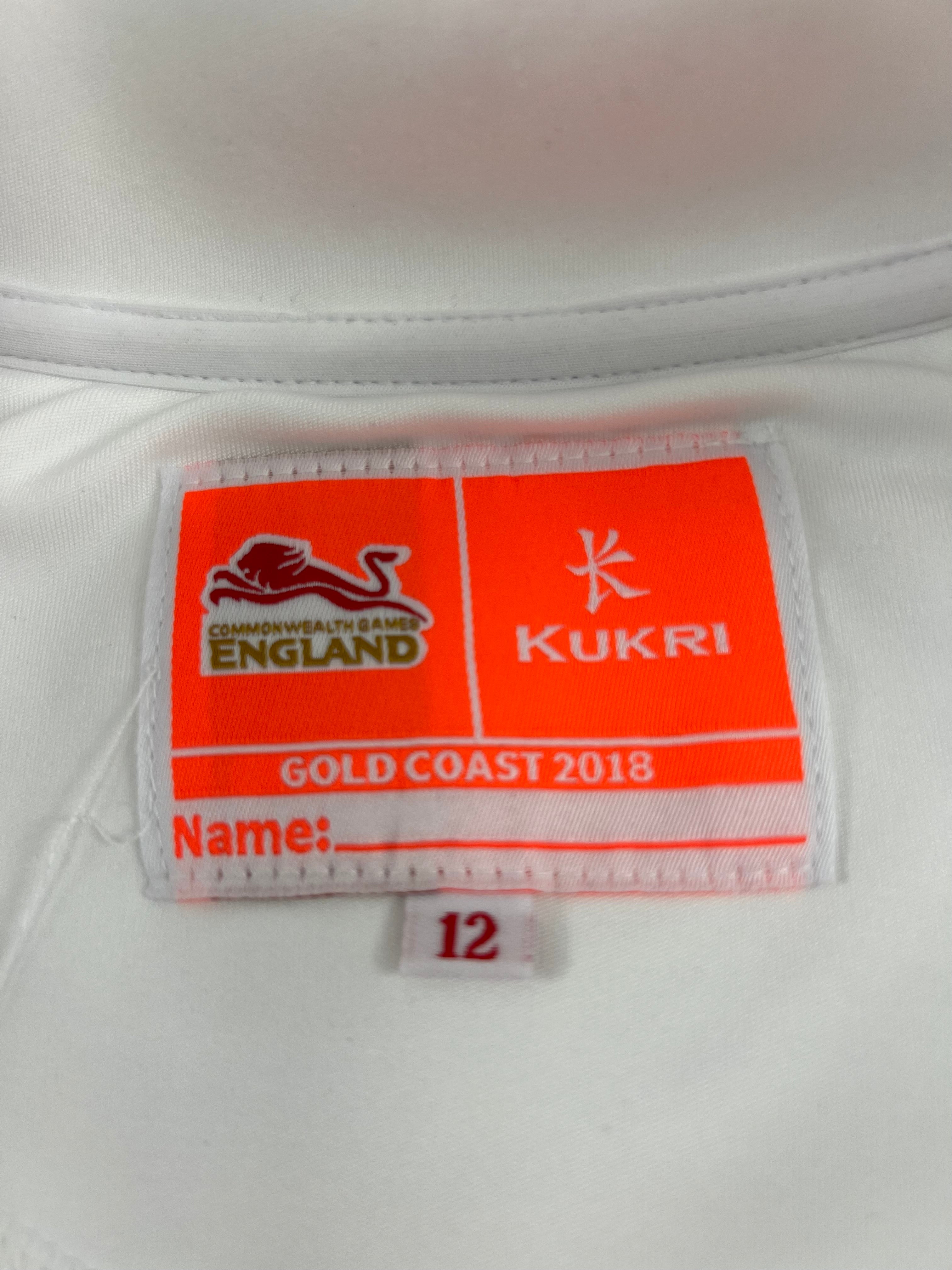 Close-up of label inside Team England women's top showing Commonwealth Games Gold Coast 2018 and Kukri branding