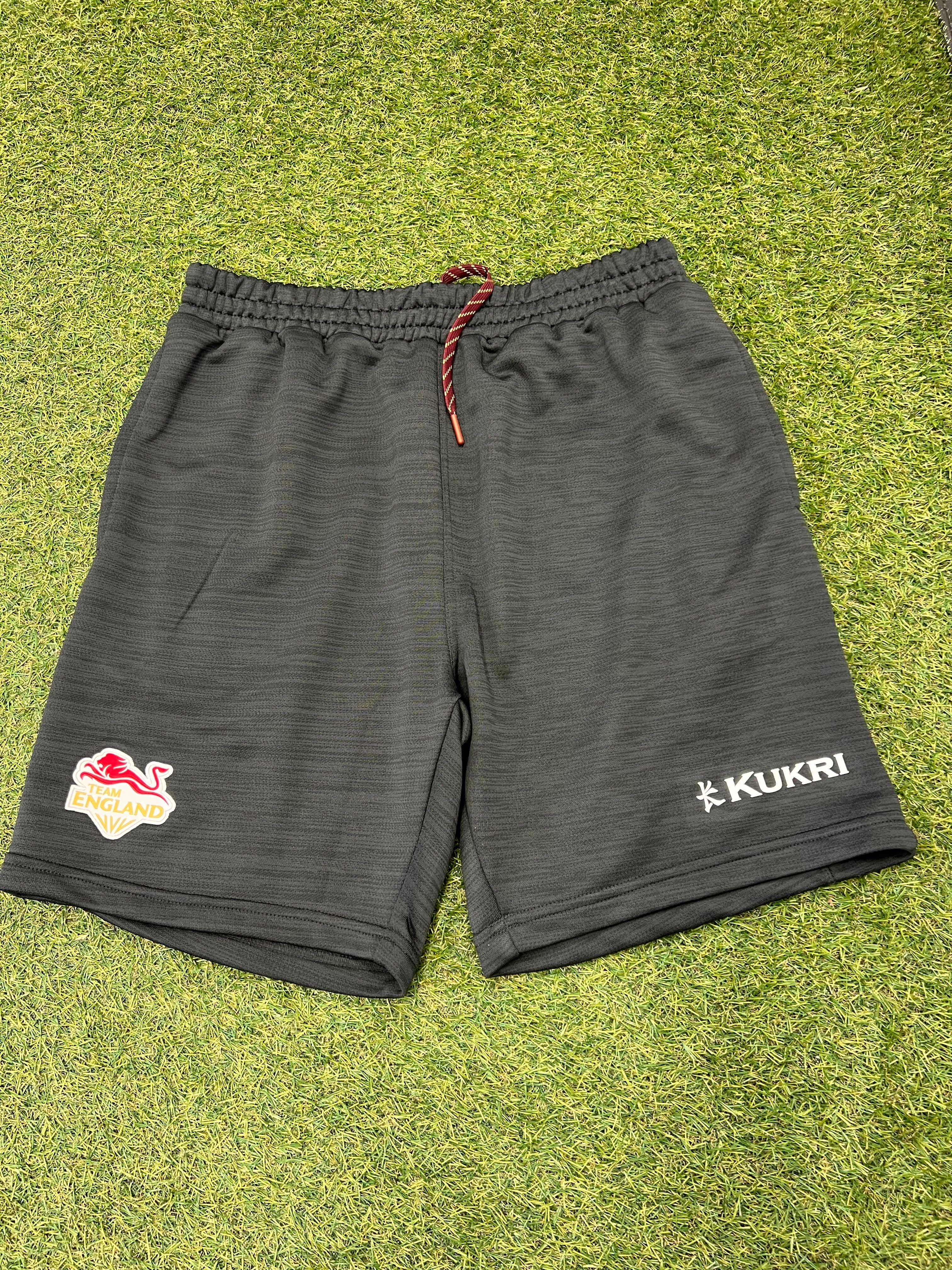 Front view of Kukri Team England dark grey sports shorts with logo and drawstring waistband