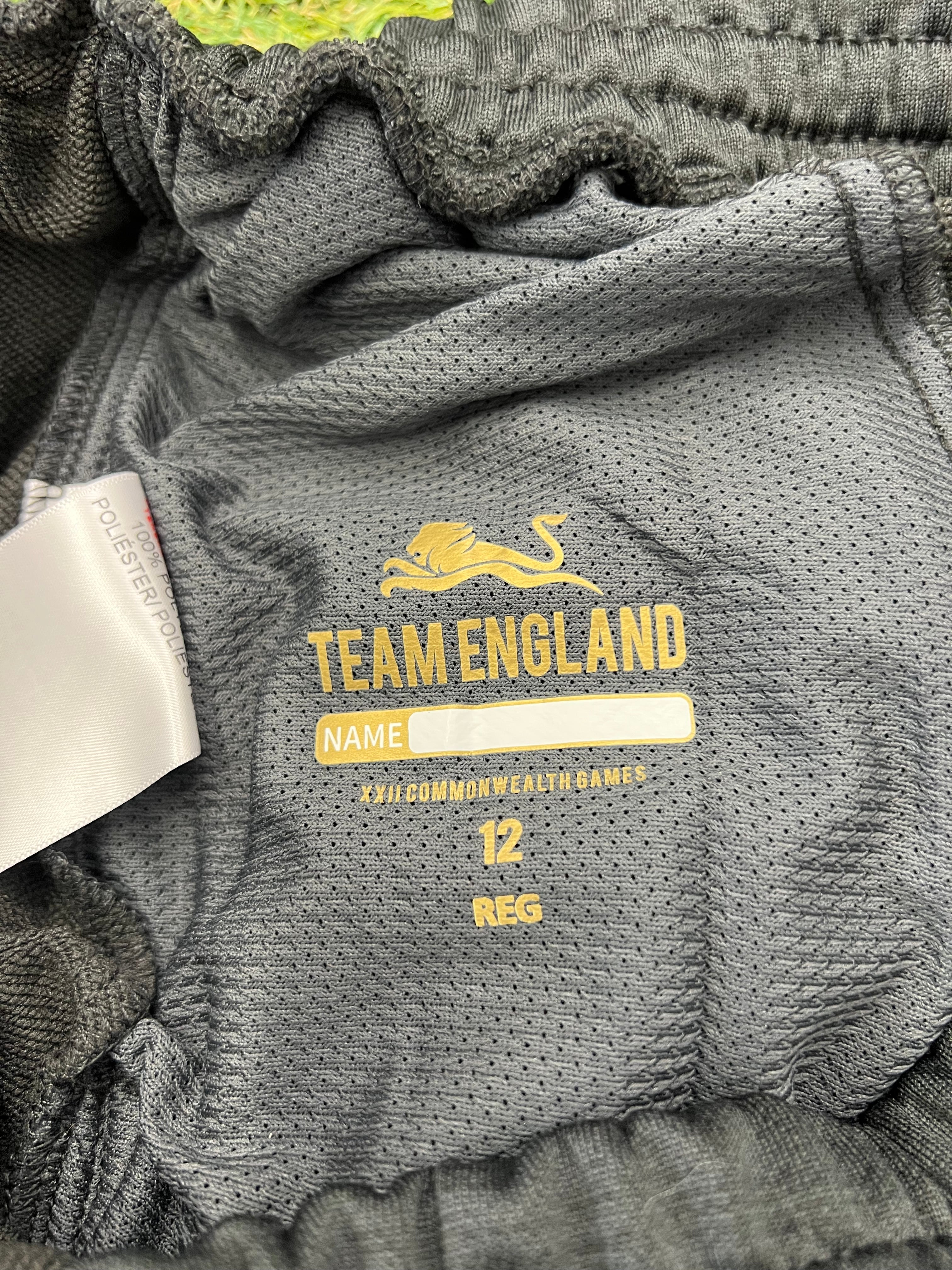 Close-up of inner mesh lining with Team England logo and size label inside shorts