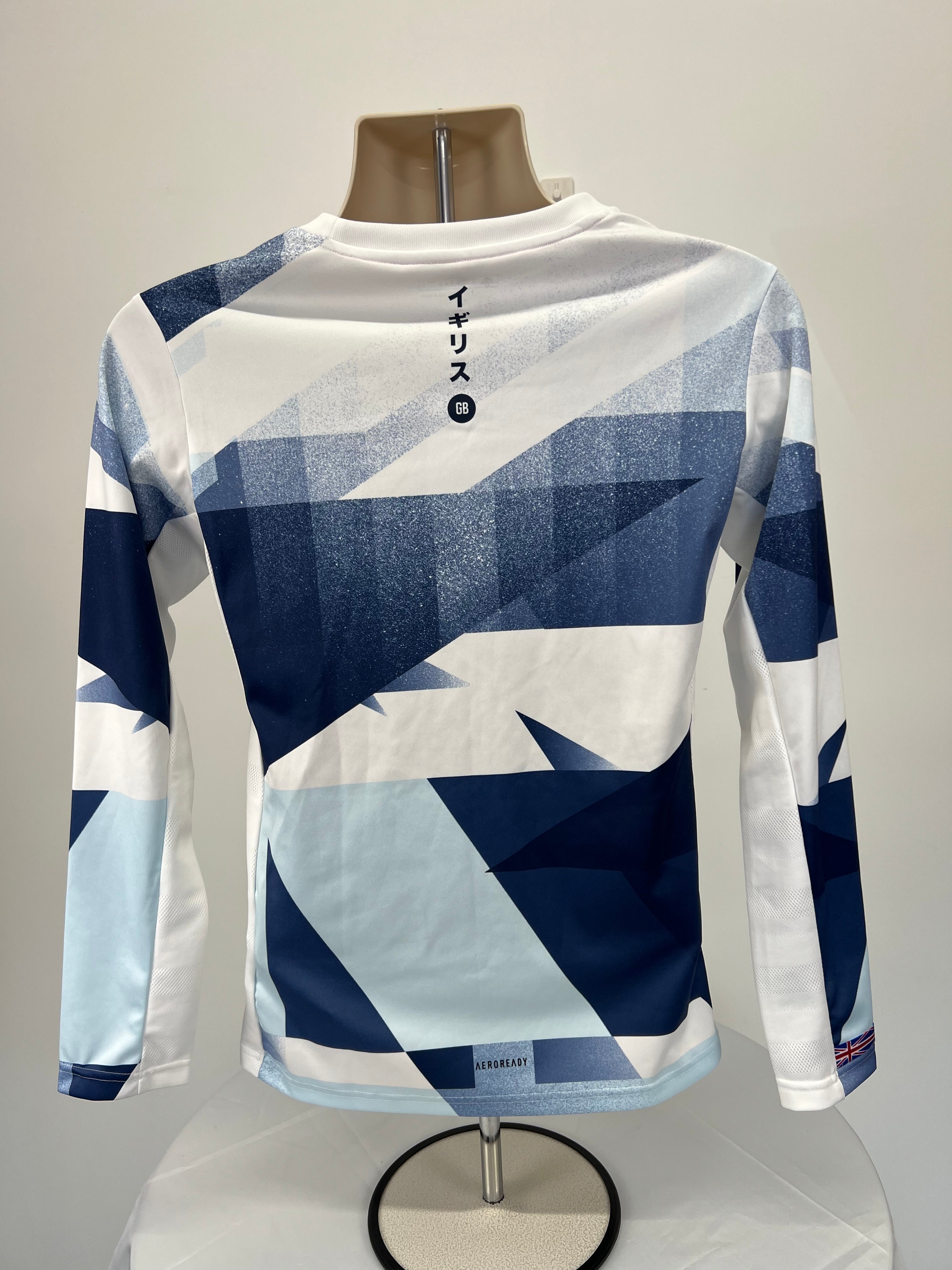 Back view of women’s adidas Team GB long sleeve top showing geometric pattern and Japanese characters