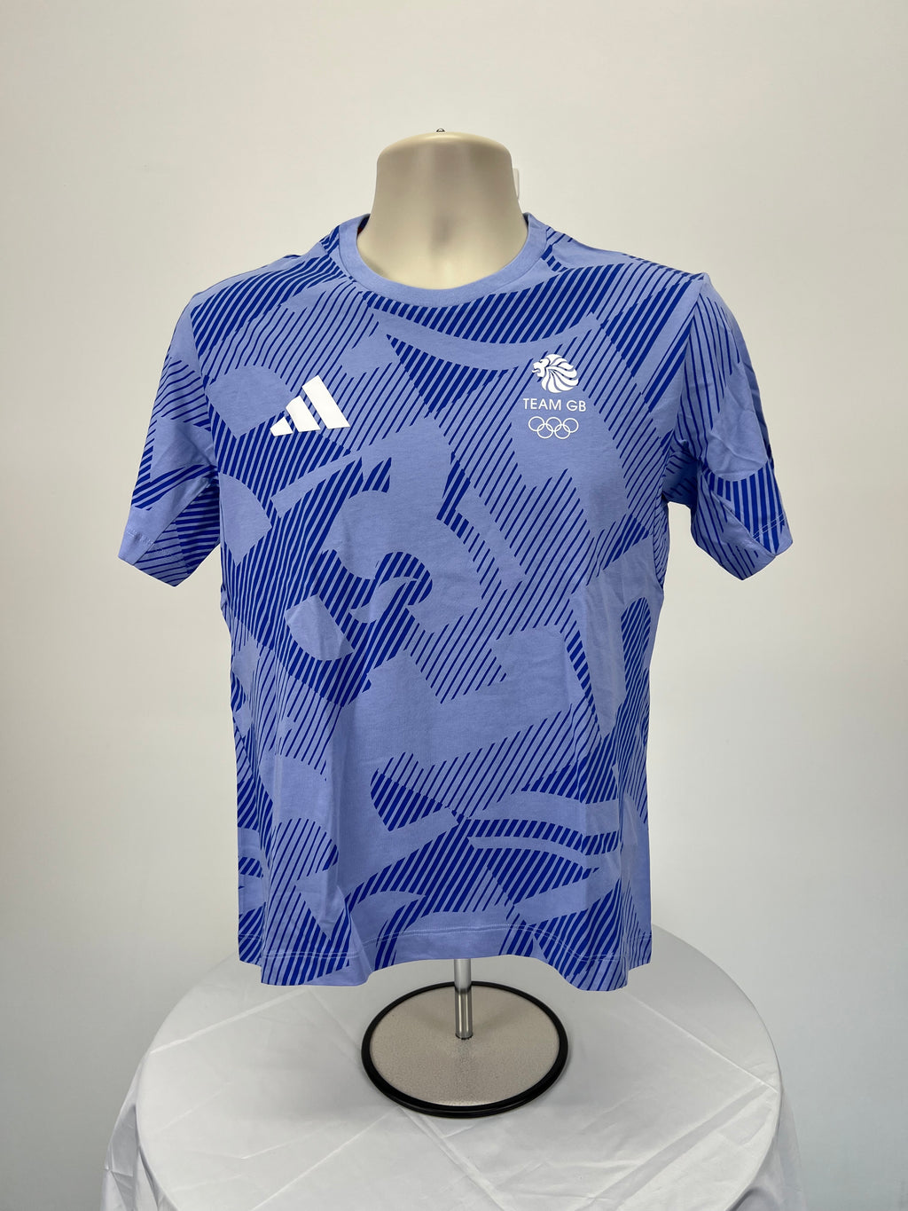 Front view of women's Adidas Team GB patterned blue T-shirt with logo and Olympic emblem