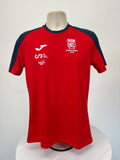 Front view of red men’s Spanish Rowing Team t-shirt with black shoulder accents and team logo