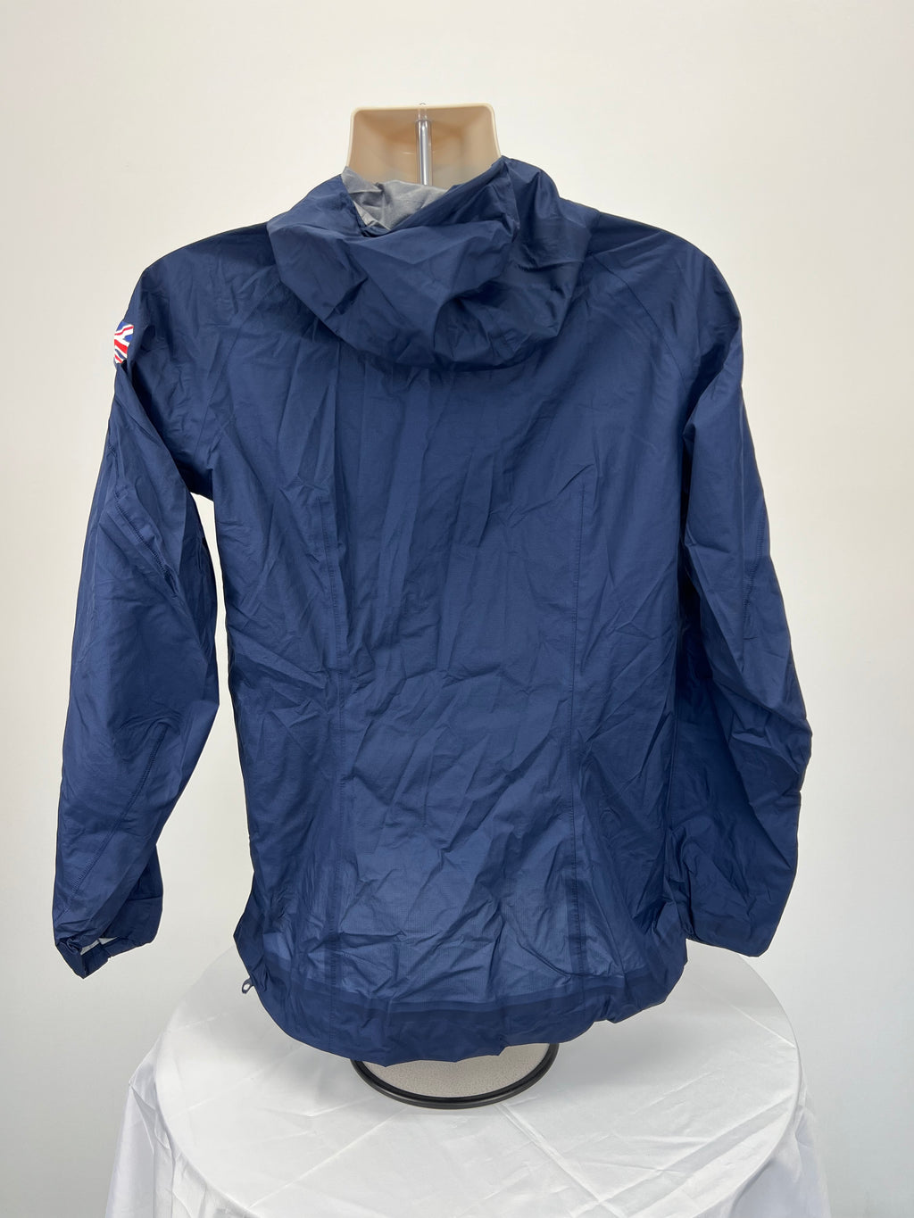 Back view of navy blue hooded Adidas Team GB jacket