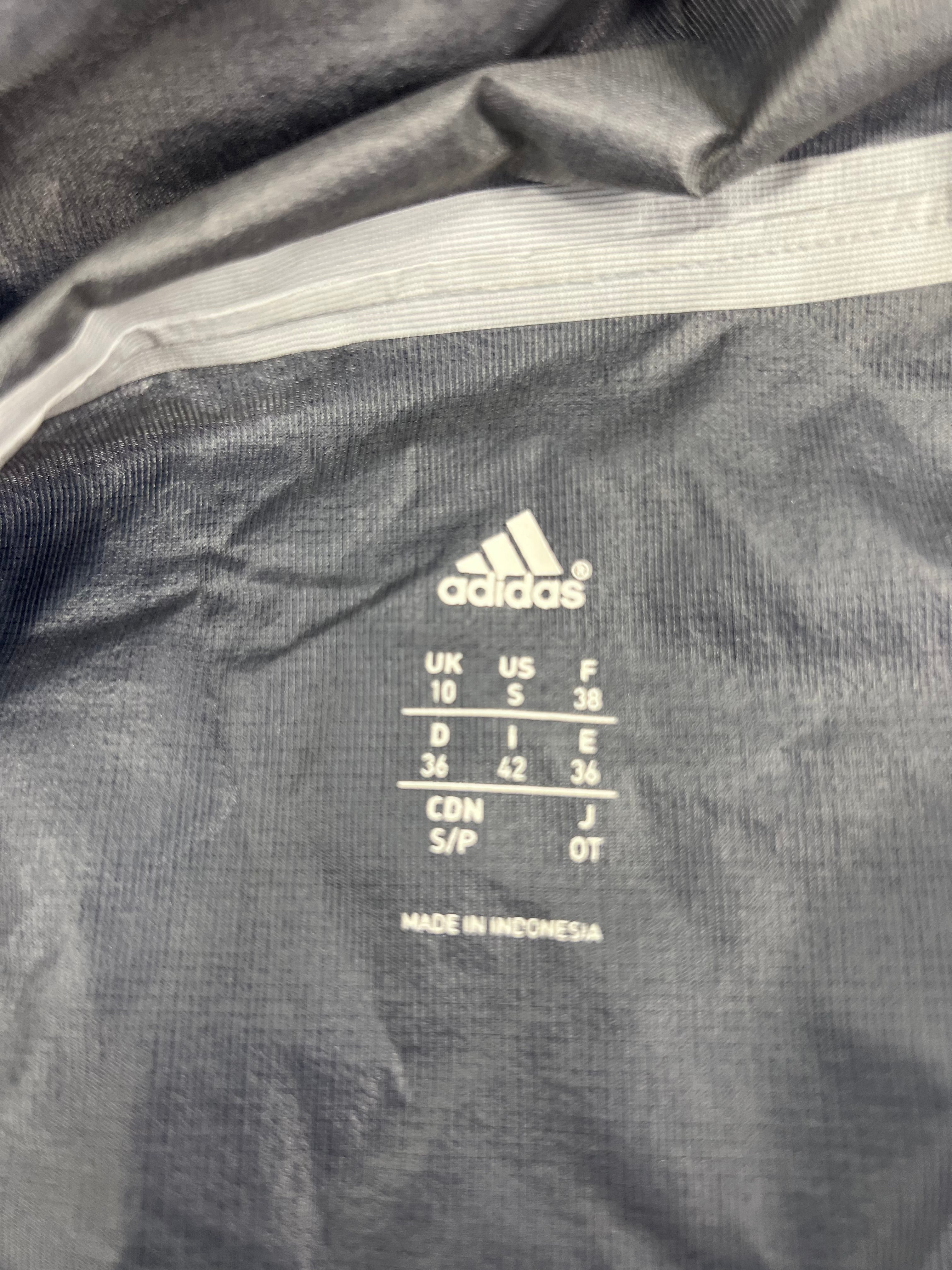 Inside tag showing Adidas sizing and Made in Indonesia label