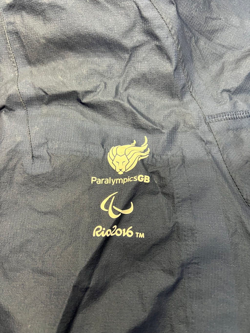 Detailed shot of Paralympics GB and Rio 2016 logos printed on the chest