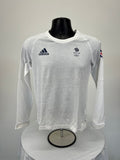 Front view of white Adidas Team GB women’s long sleeve top with logos