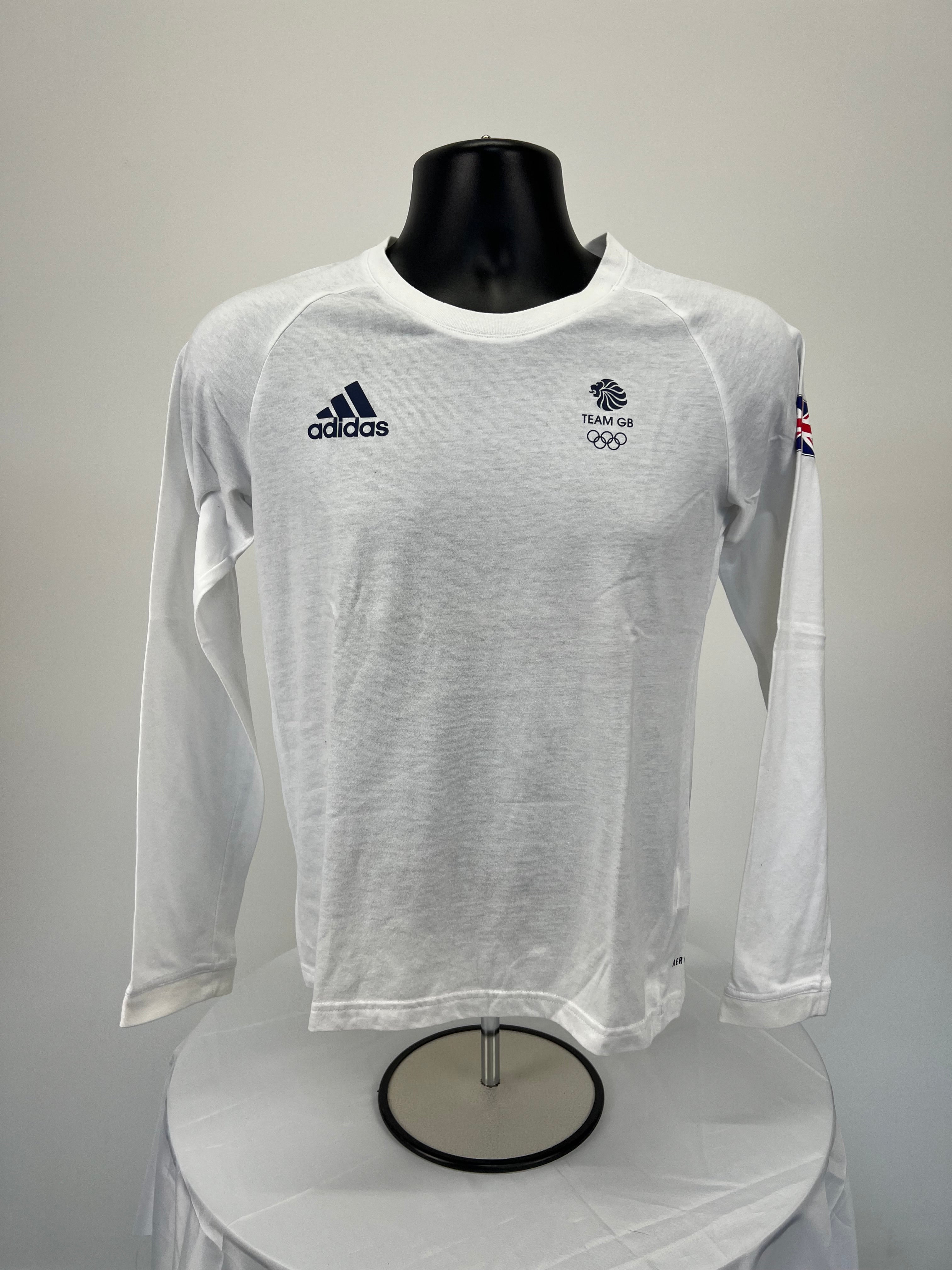 Front view of white Adidas Team GB women’s long sleeve top with logos
