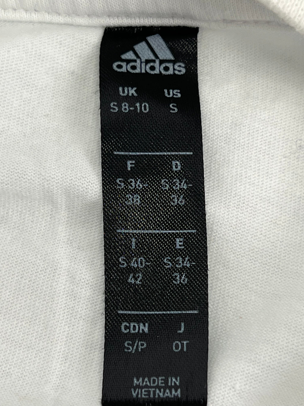 Adidas size label with size small and made in Vietnam details