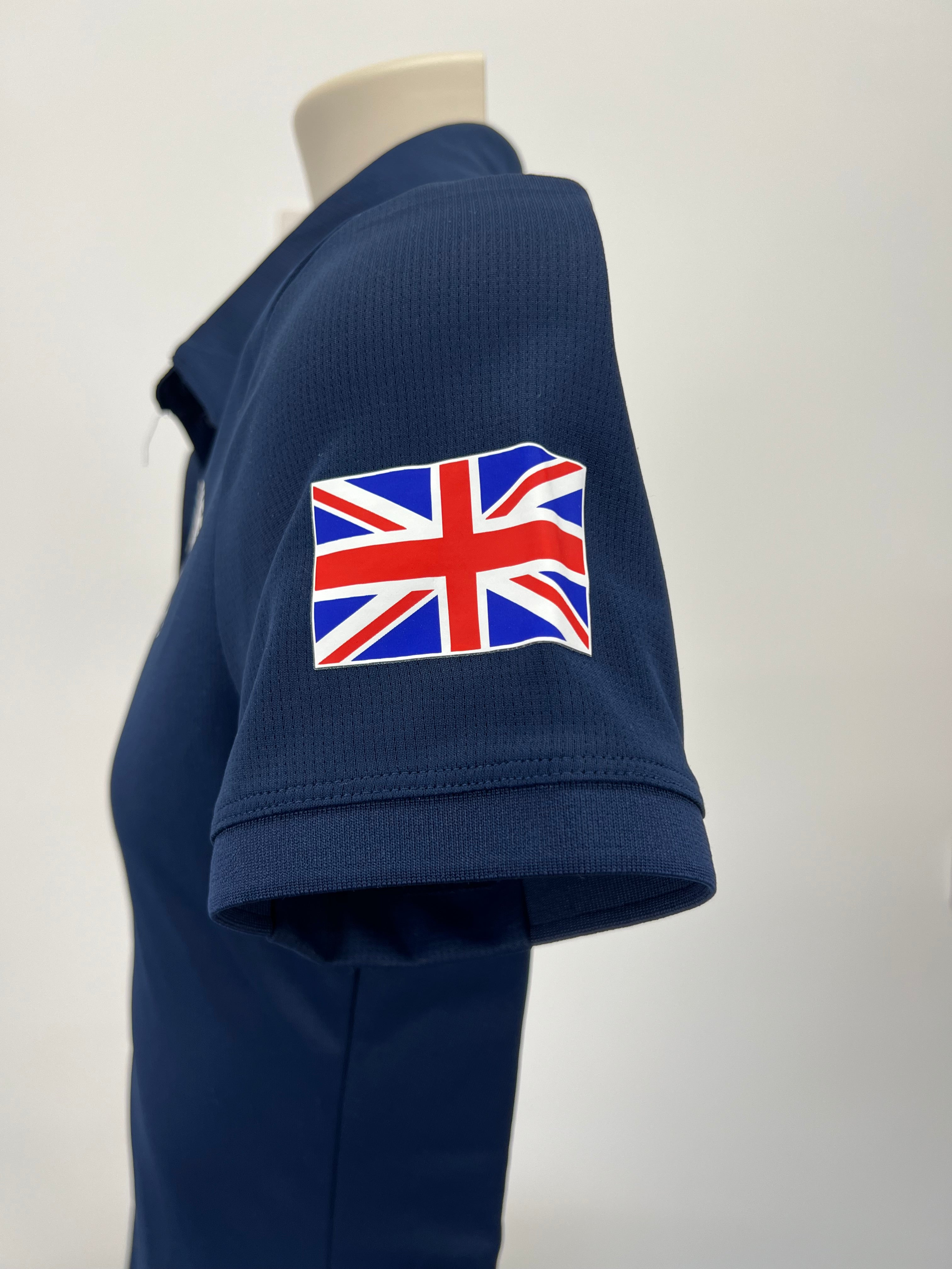 Close-up of right sleeve with sewn UK flag patch on navy blue Adidas polo shirt